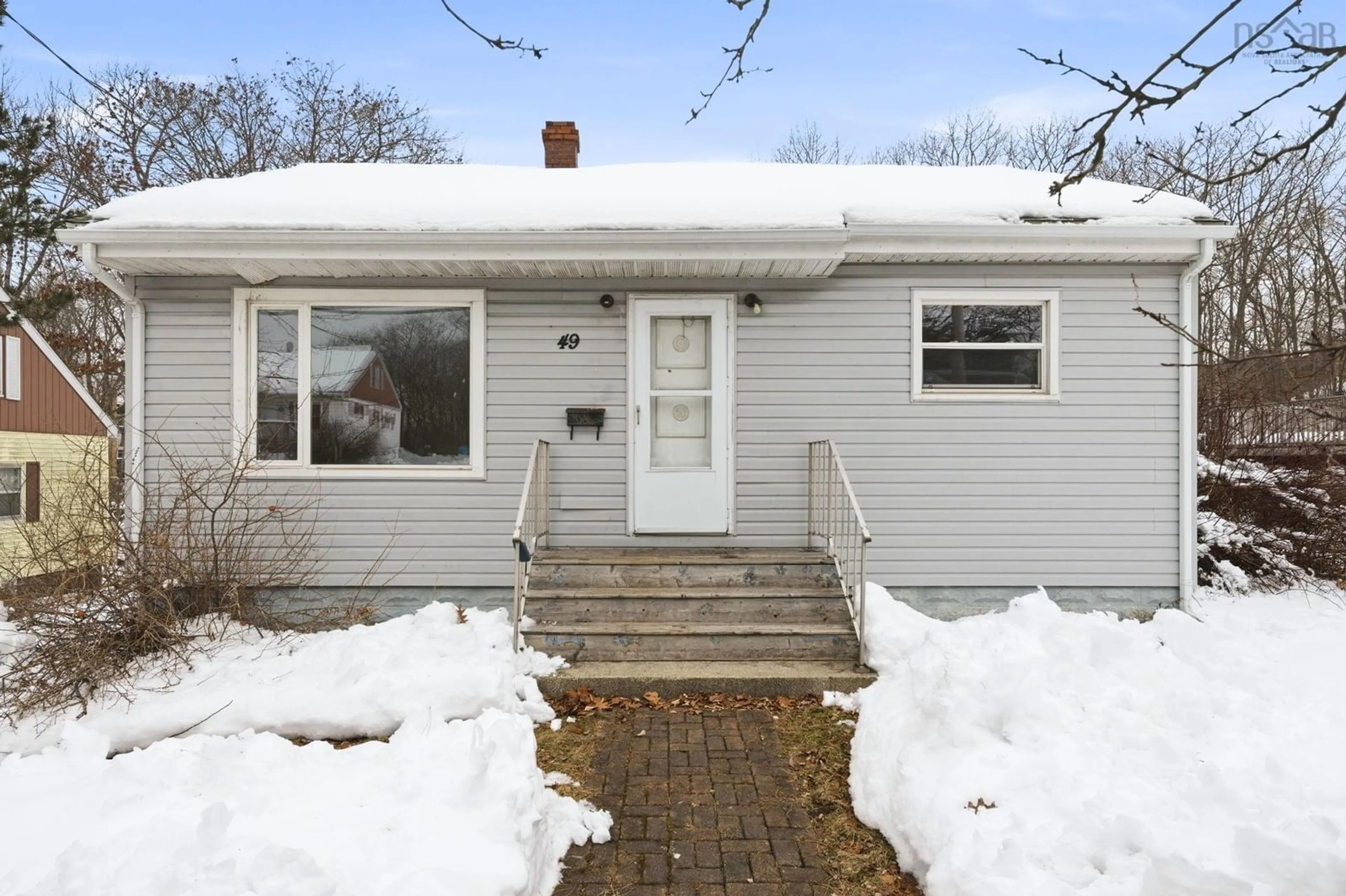 Home with vinyl exterior material, street for 49 Primrose St, Dartmouth Nova Scotia B3A 4C6