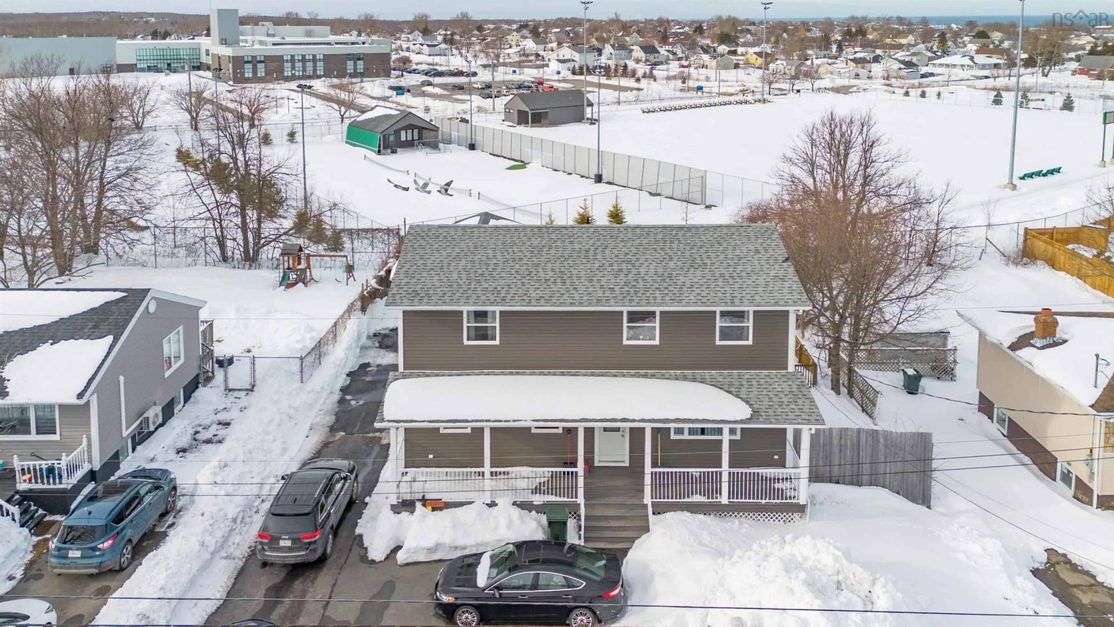 A pic from outside/outdoor area/front of a property/back of a property/a pic from drone, street for 661 Willow St, New Waterford Nova Scotia B1H 3W3