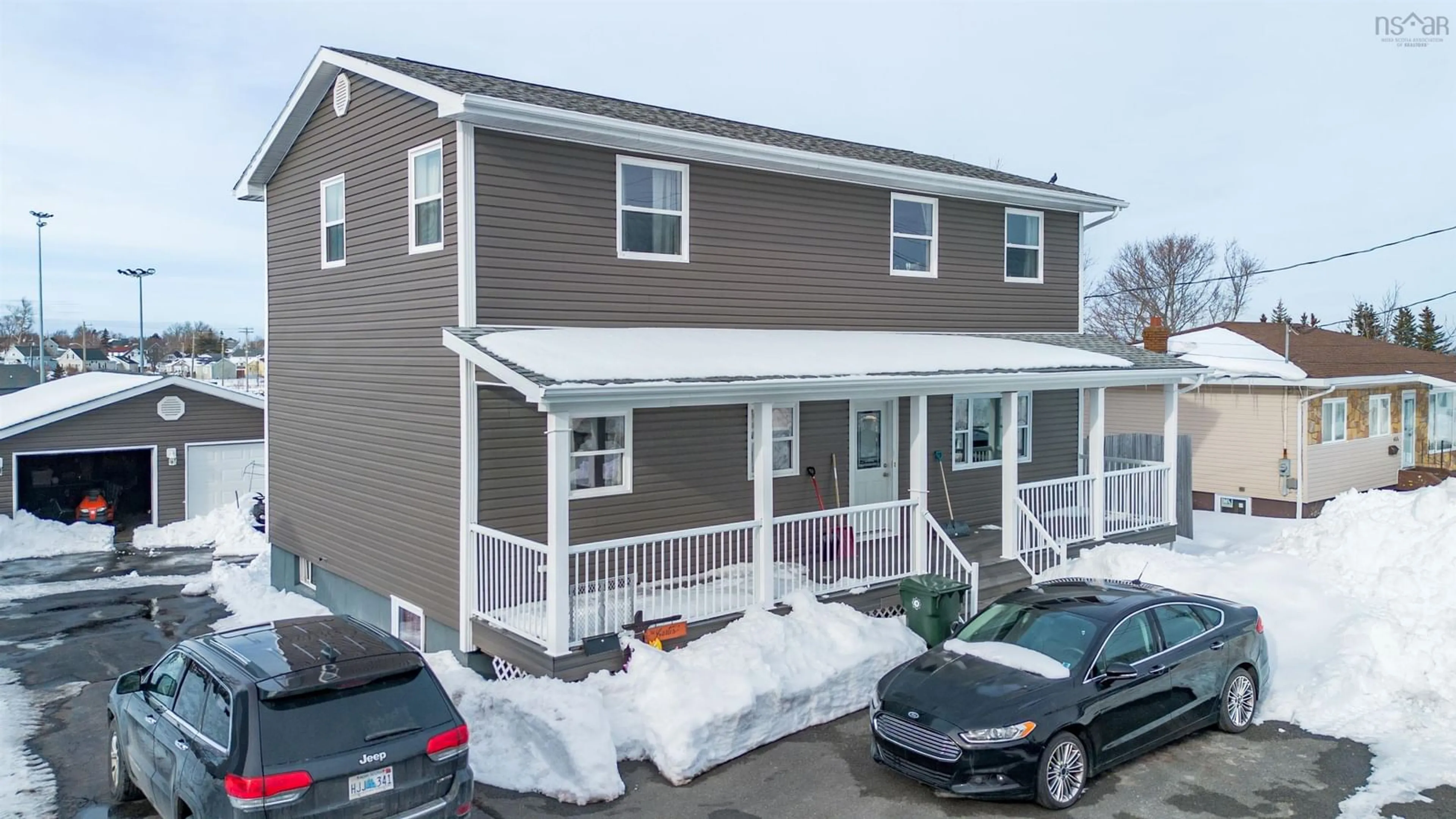 Home with vinyl exterior material, street for 661 Willow St, New Waterford Nova Scotia B1H 3W3