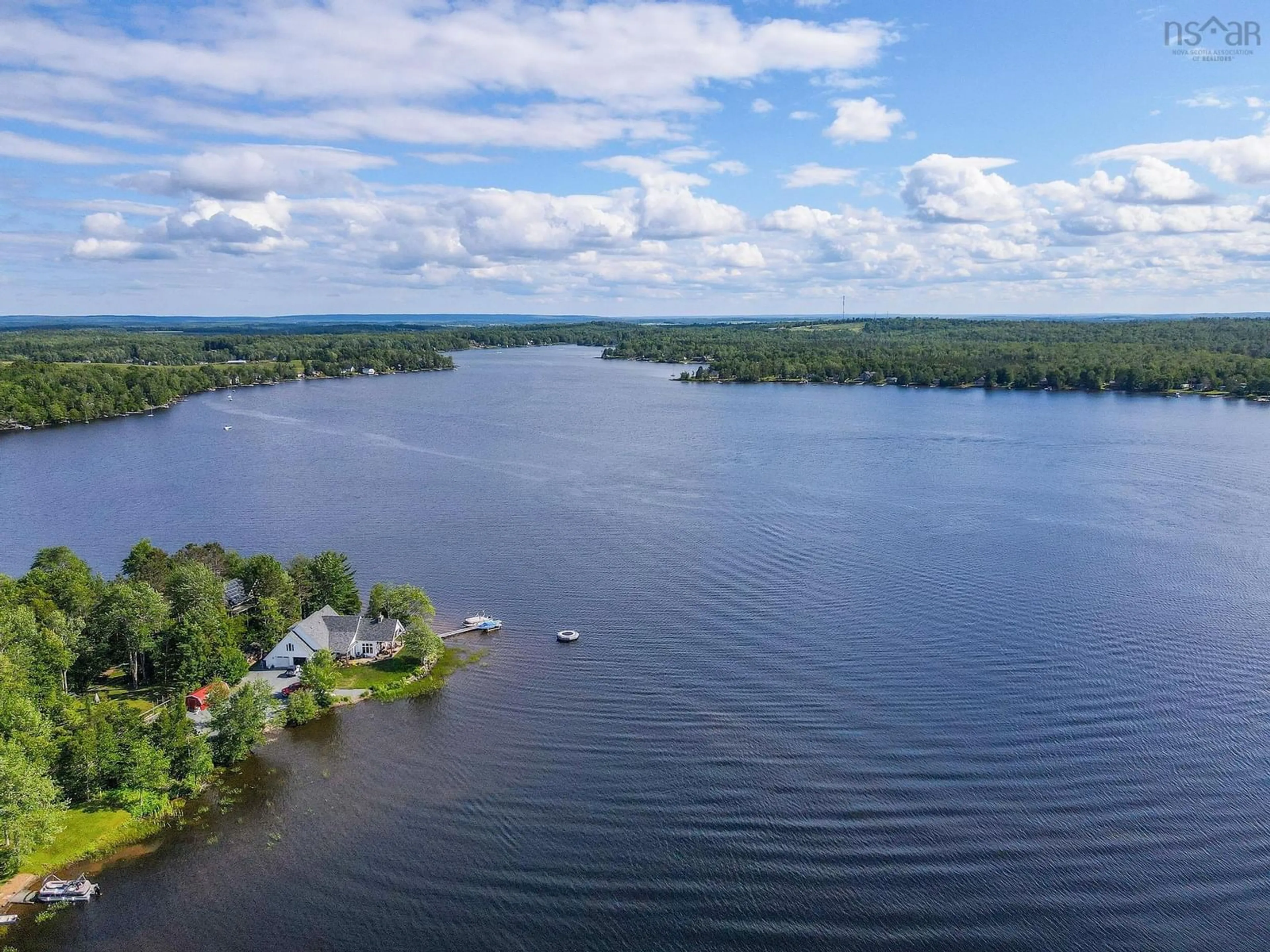 A pic from outside/outdoor area/front of a property/back of a property/a pic from drone, water/lake/river/ocean view for 183 Lakewood Dr, Shortts Lake Nova Scotia B2N 1C0