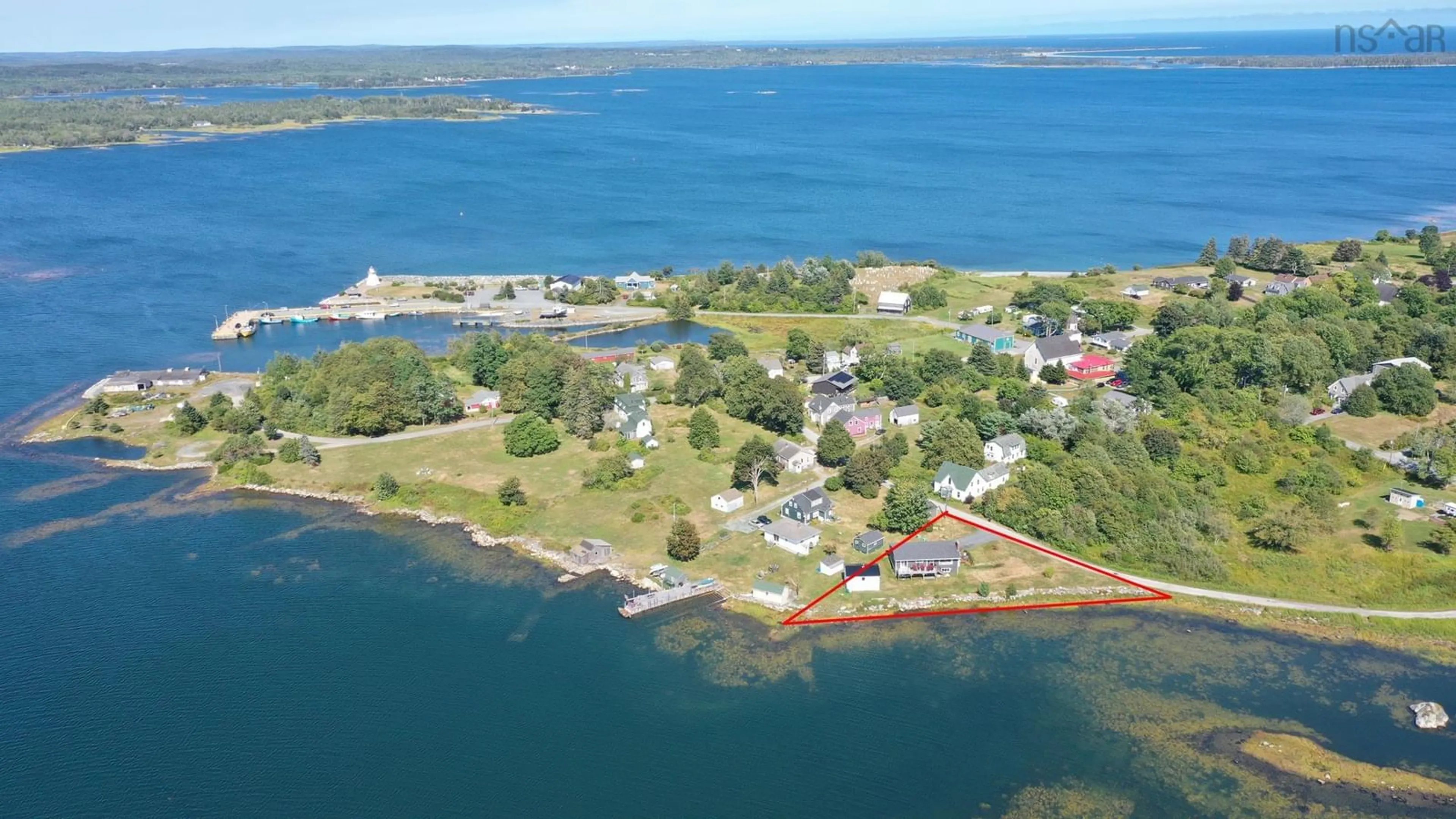 A pic from outside/outdoor area/front of a property/back of a property/a pic from drone, water/lake/river/ocean view for 31 Medway St, Port Medway Nova Scotia B0J 2T0