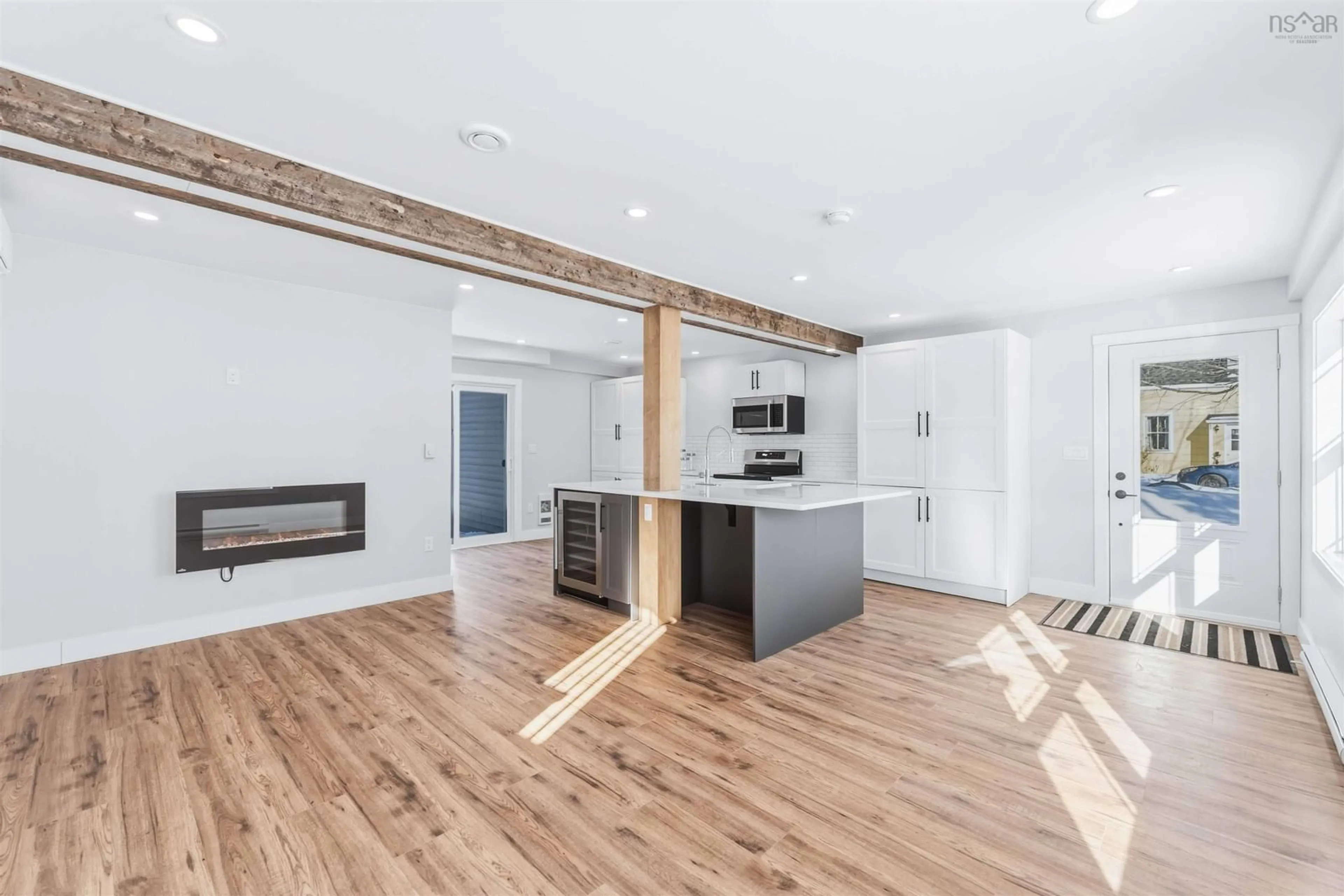 Open concept kitchen, wood/laminate floor for 139 First Ave, Digby Nova Scotia B0V 1A0