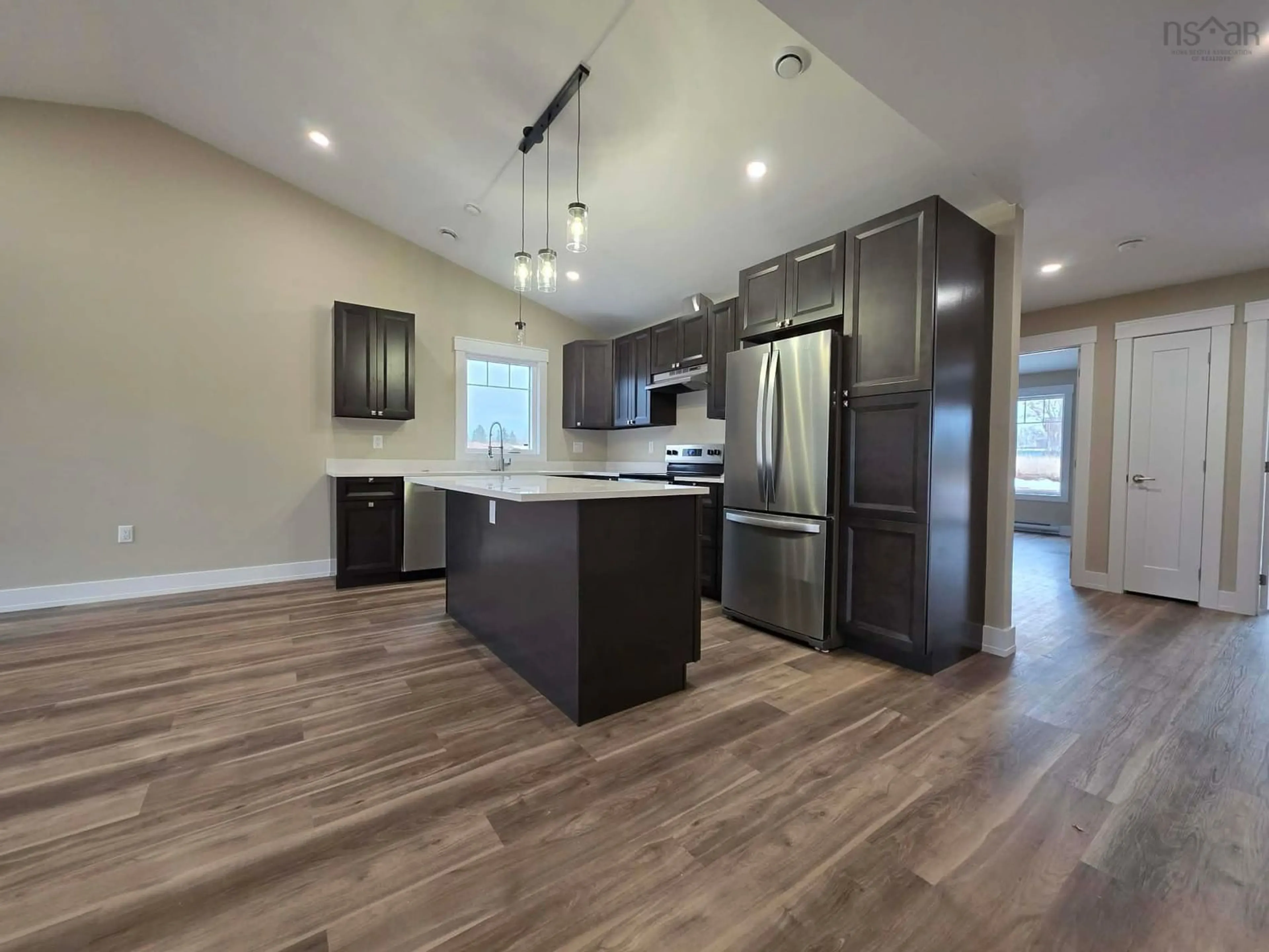 Open concept kitchen, wood/laminate floor for 56A Summer Hill Pl, Upper Onslow Nova Scotia B6L 0G9
