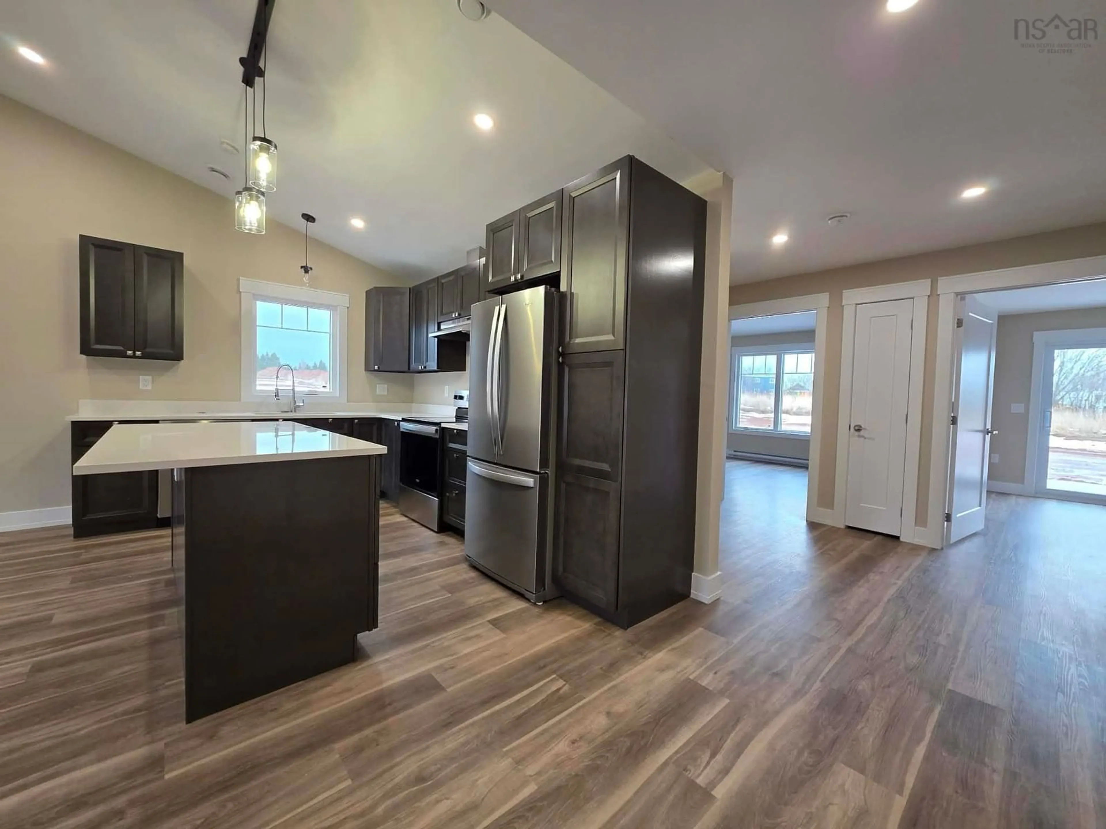 Open concept kitchen, wood/laminate floor for 56A Summer Hill Pl, Upper Onslow Nova Scotia B6L 0G9