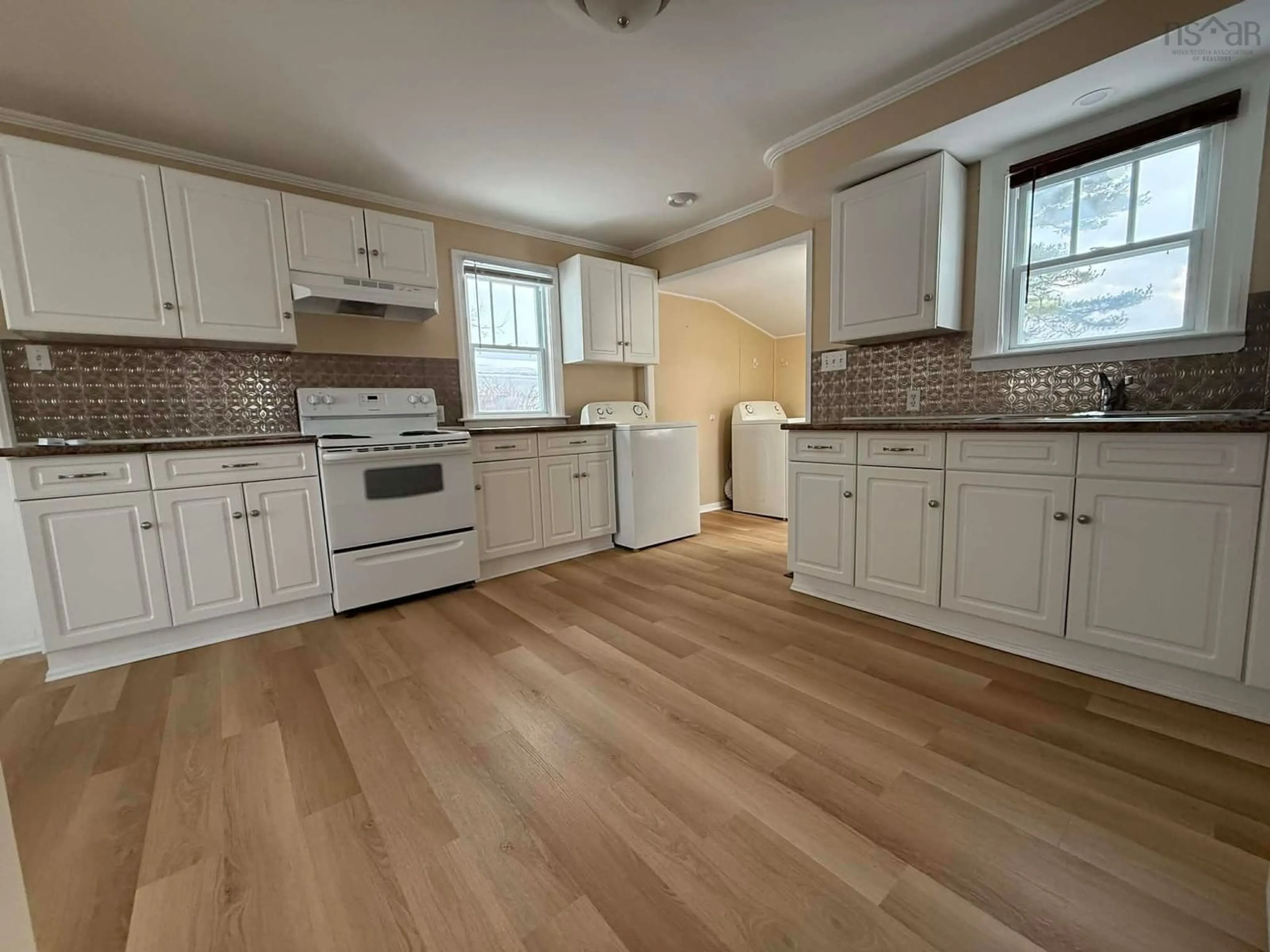 Open concept kitchen, unknown for 21 South St, Carleton Corner Nova Scotia B0S 1C0