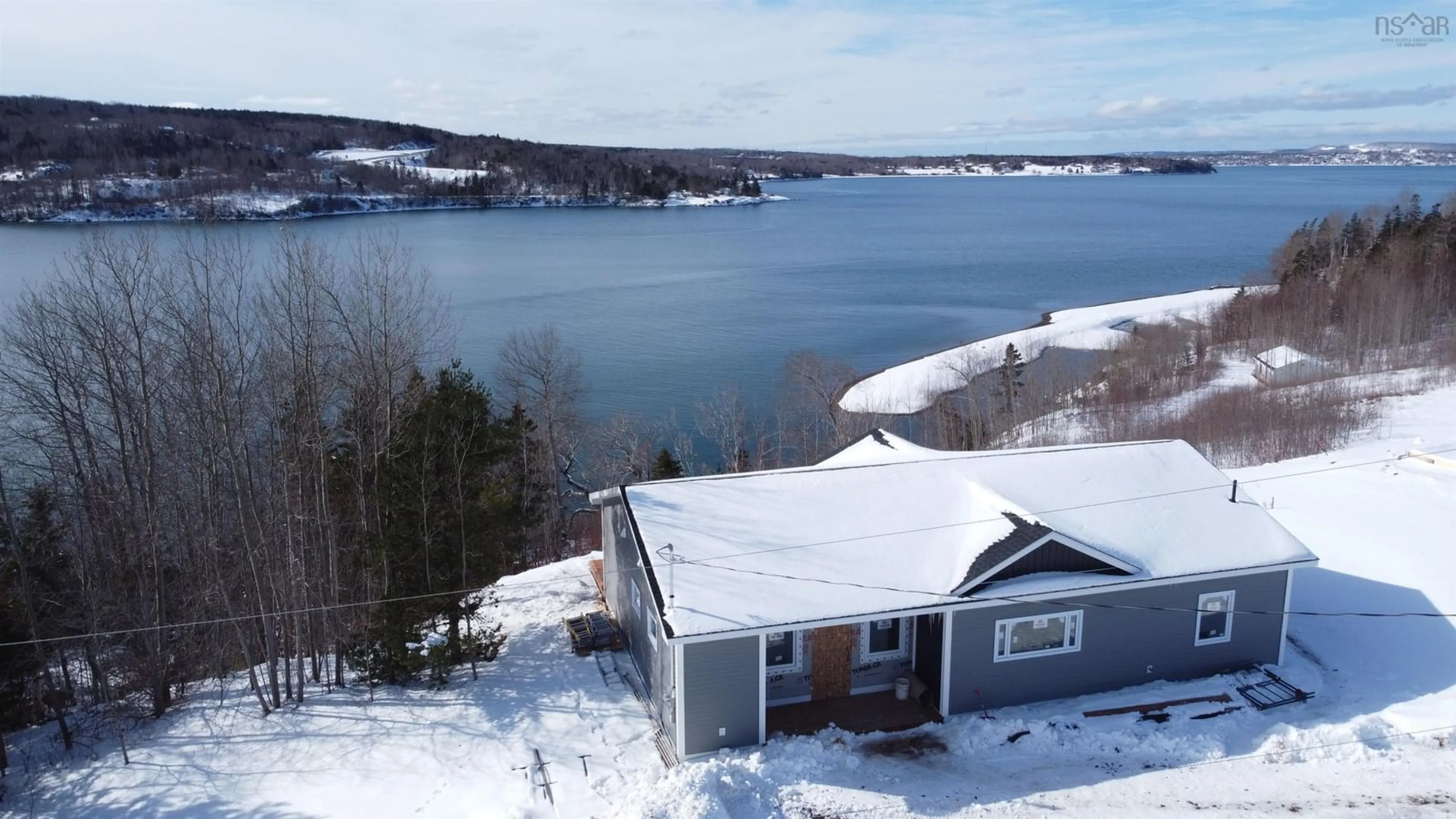 A pic from outside/outdoor area/front of a property/back of a property/a pic from drone, water/lake/river/ocean view for 41 Colonial Arms Drive, Deep Brook Nova Scotia B0S 1J0