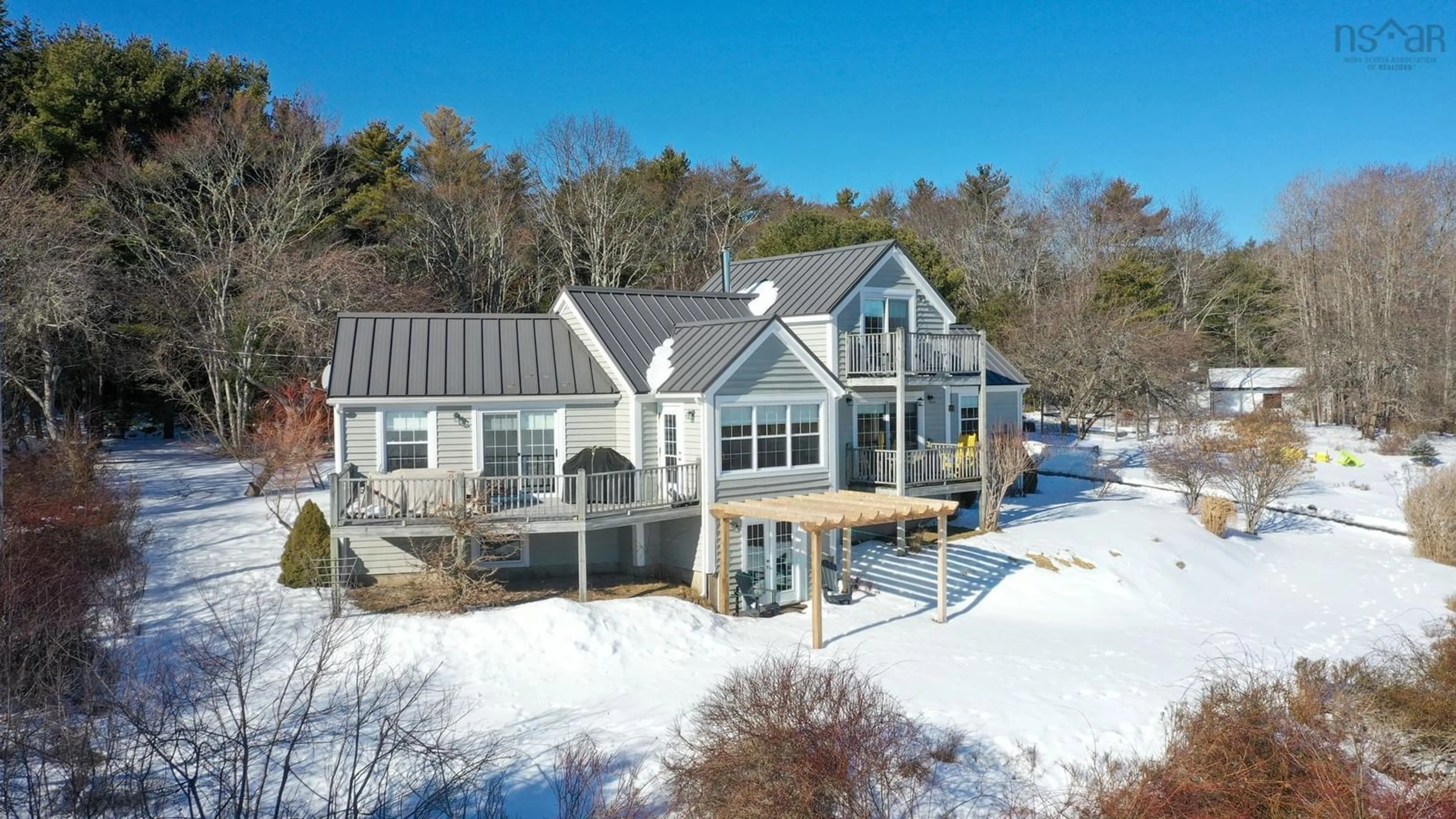 A pic from outside/outdoor area/front of a property/back of a property/a pic from drone, water/lake/river/ocean view for 287 East Side Martins River Rd, Martins River Nova Scotia B0J 2E0