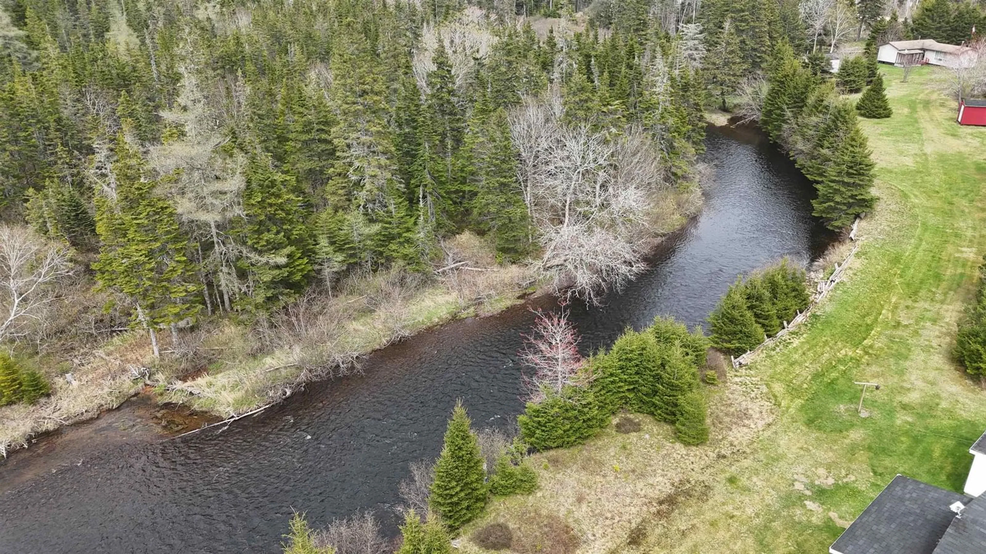 A pic from outside/outdoor area/front of a property/back of a property/a pic from drone, water/lake/river/ocean view for 1235 Loch Lomond Rd, Grand River Falls Nova Scotia B0E 1M0