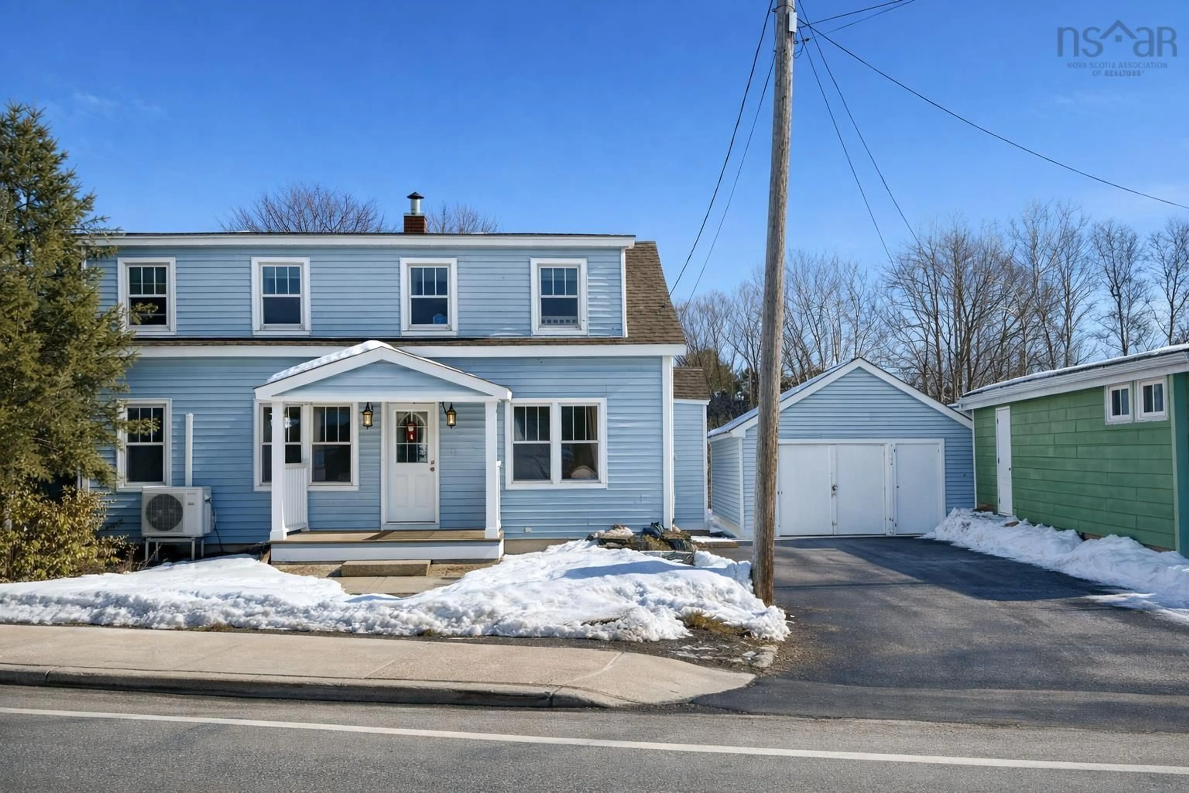 Home with vinyl exterior material, street for 6515 Highway 3, Western Shore Nova Scotia B0J 3M0