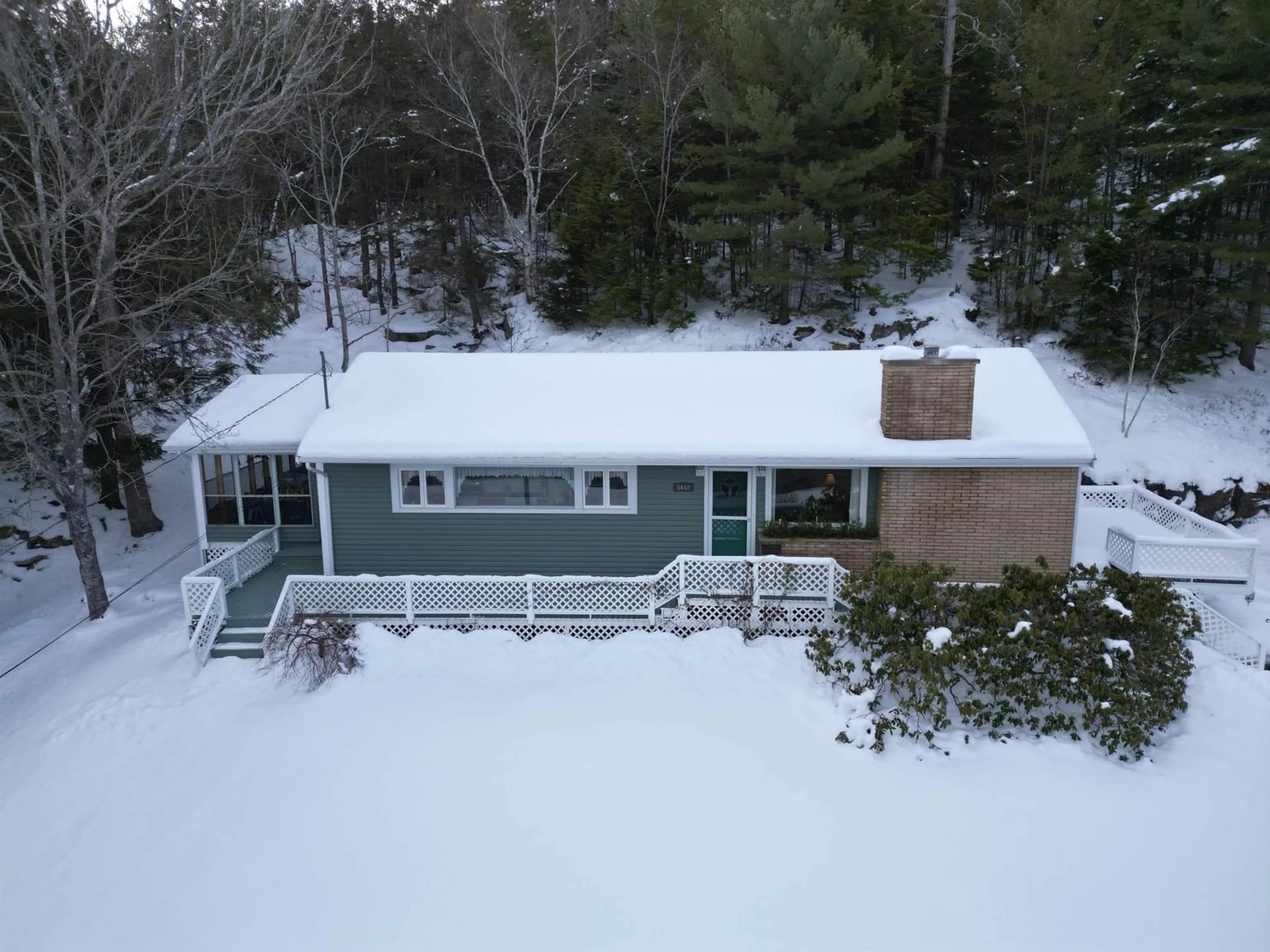 A pic from outside/outdoor area/front of a property/back of a property/a pic from drone, unknown for 5442 Highway 2, Grand Lake Nova Scotia B2T 1B4