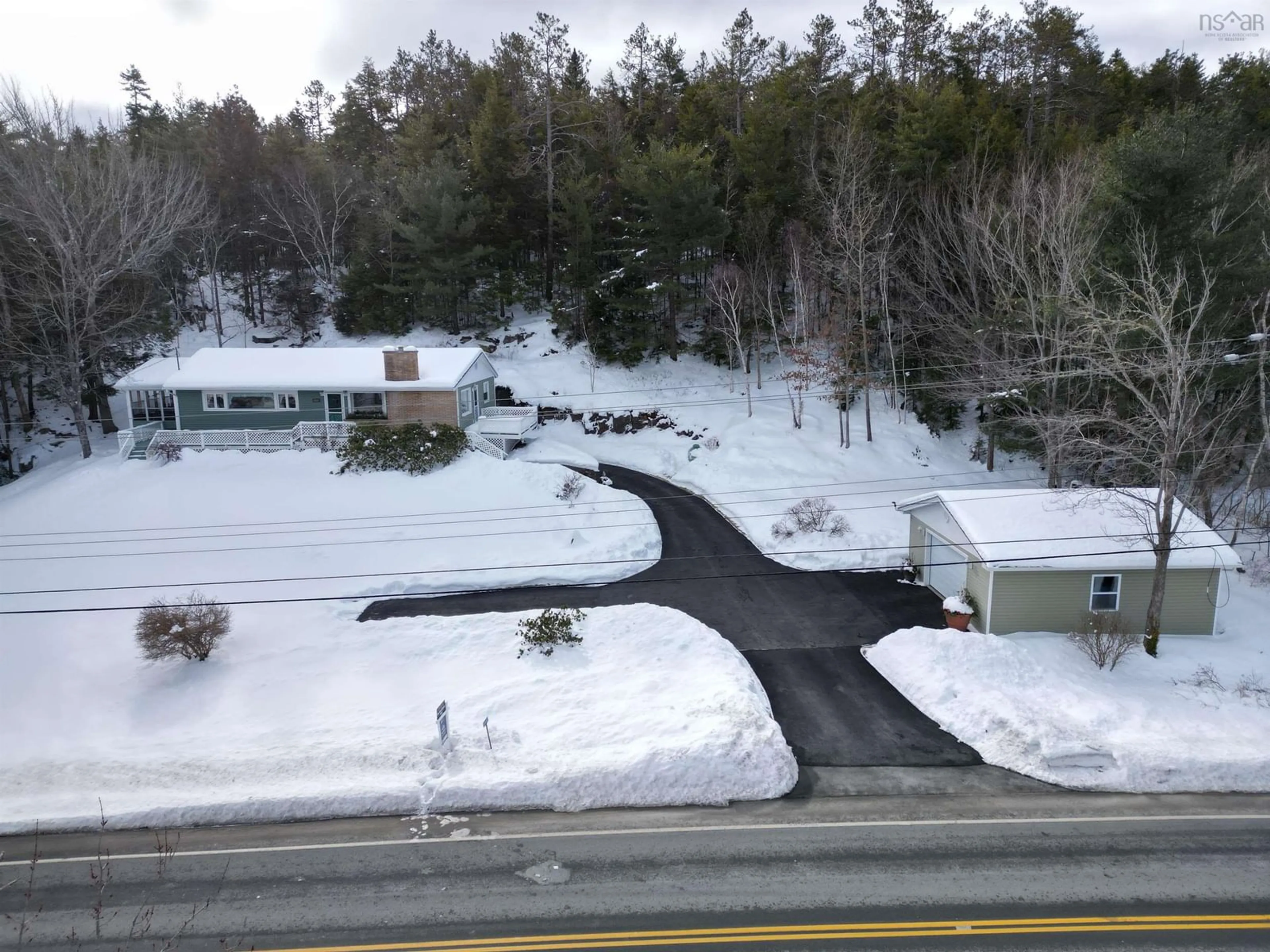 A pic from outside/outdoor area/front of a property/back of a property/a pic from drone, street for 5442 Highway 2, Grand Lake Nova Scotia B2T 1B4