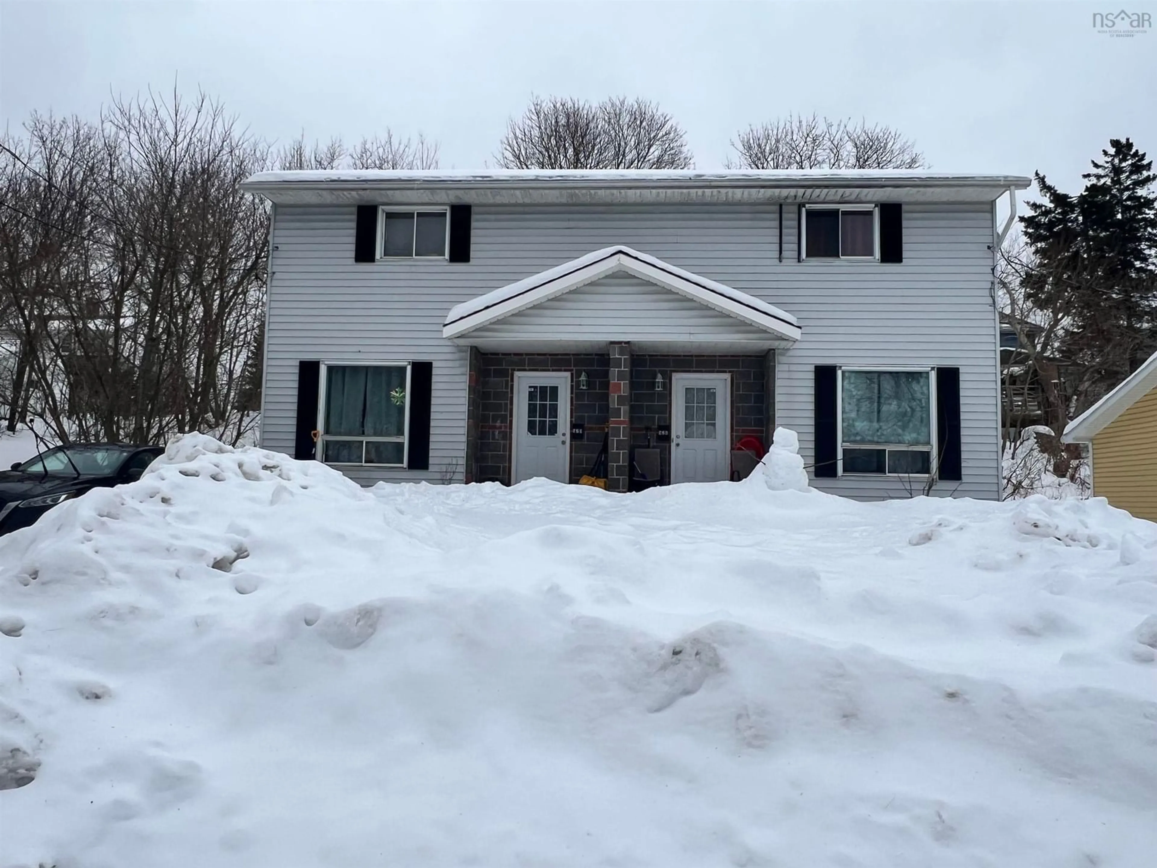 Home with vinyl exterior material, street for 520/526 Pleasant St, New Glasgow Nova Scotia B2H 2Z9