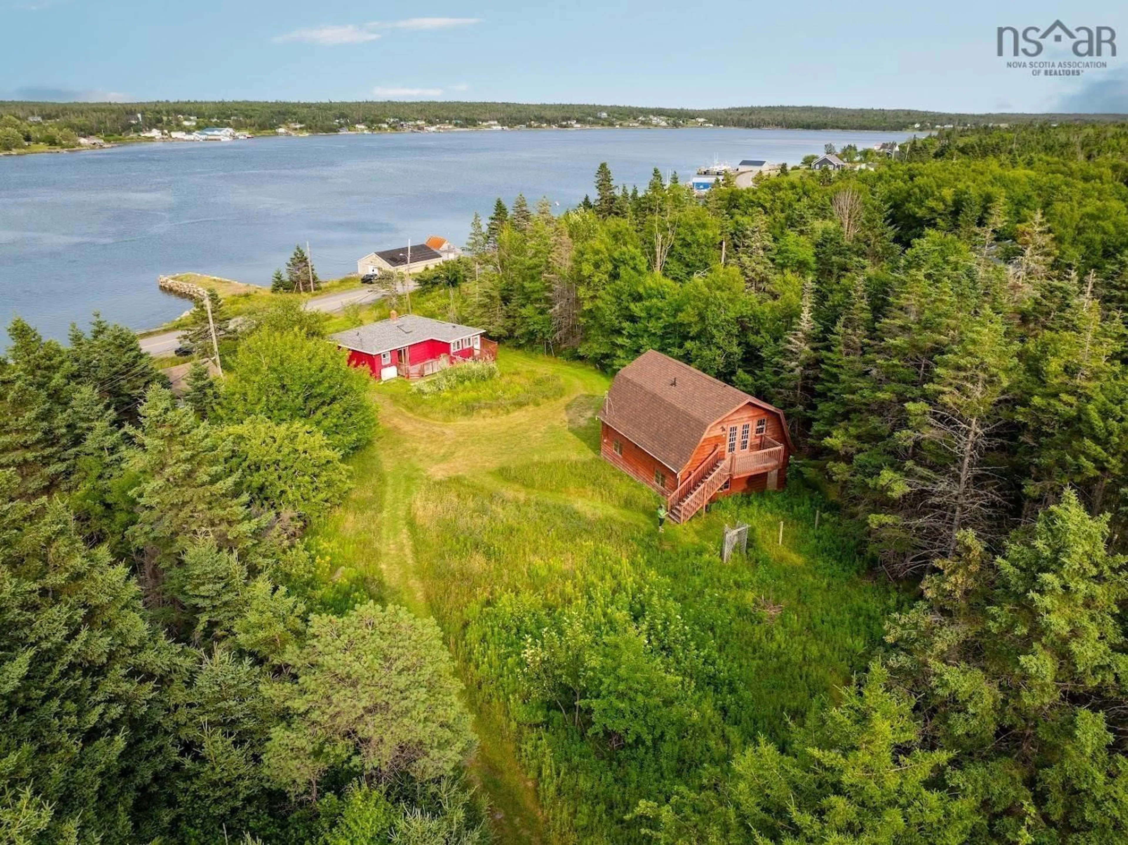 A pic from outside/outdoor area/front of a property/back of a property/a pic from drone, water/lake/river/ocean view for 1680 West Jeddore Rd, West Jeddore Nova Scotia B0J 2L0