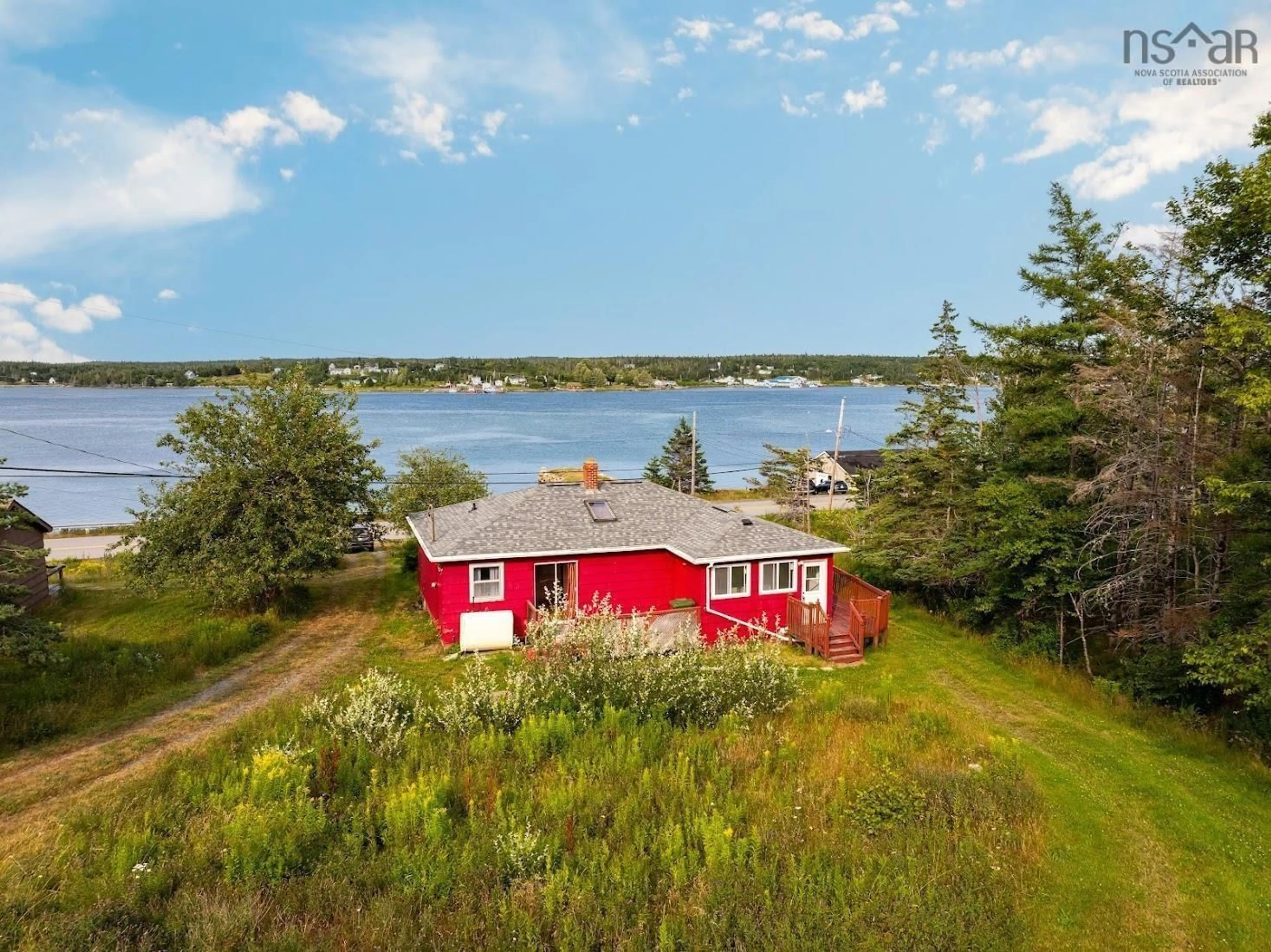 A pic from outside/outdoor area/front of a property/back of a property/a pic from drone, water/lake/river/ocean view for 1680 West Jeddore Rd, West Jeddore Nova Scotia B0J 2L0