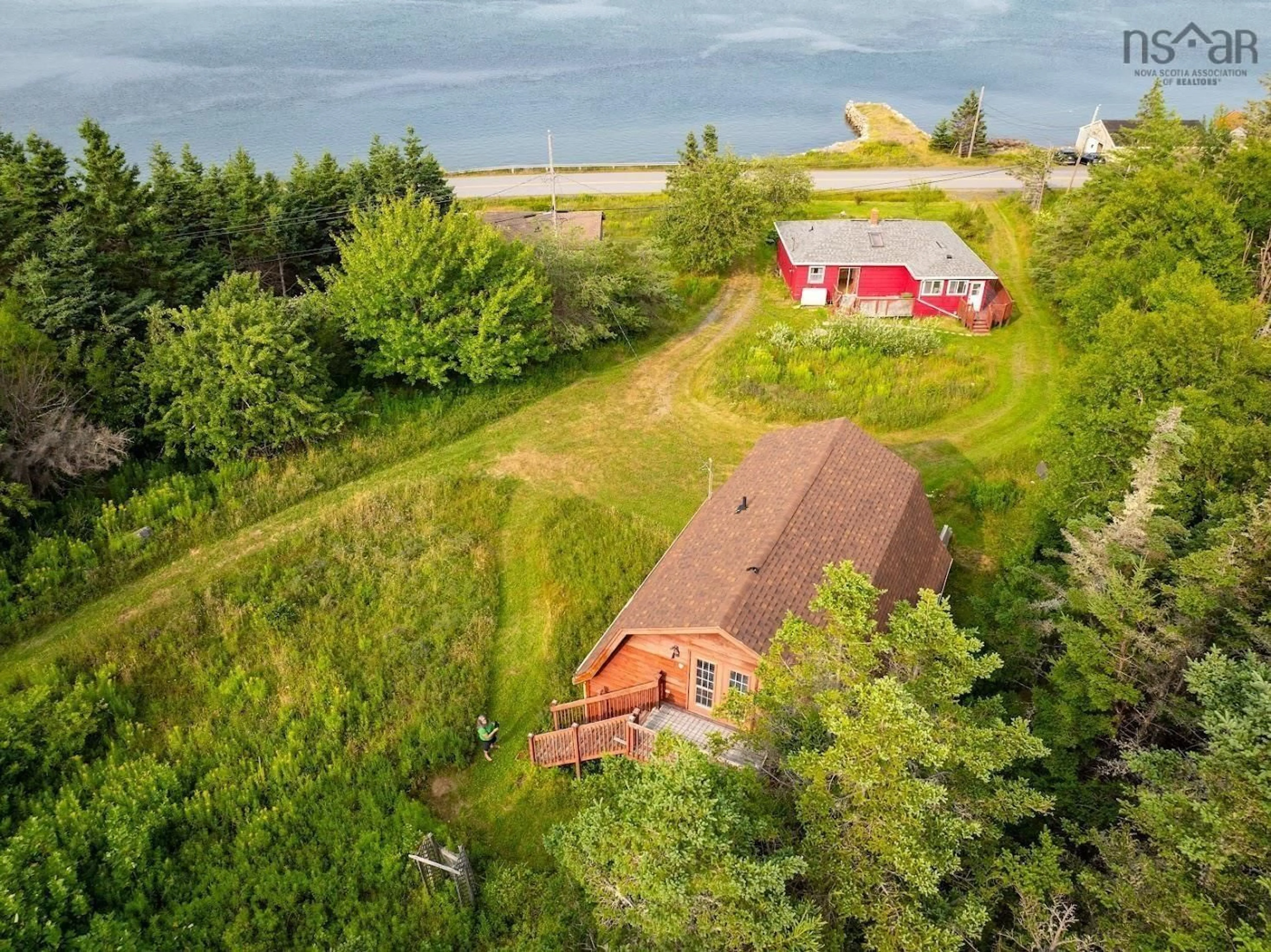 A pic from outside/outdoor area/front of a property/back of a property/a pic from drone, water/lake/river/ocean view for 1680 West Jeddore Rd, West Jeddore Nova Scotia B0J 2L0