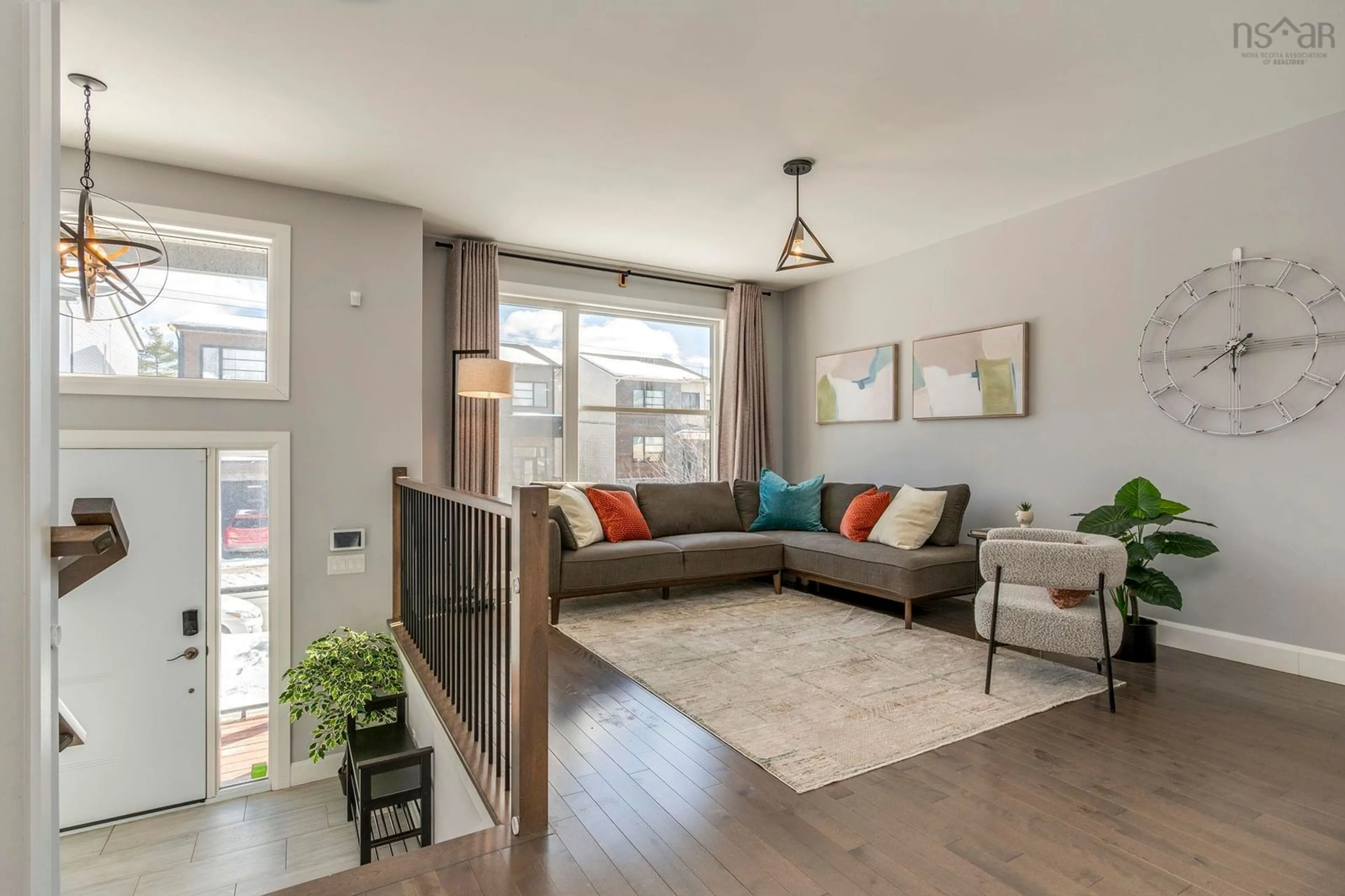 Living room with furniture, wood/laminate floor for 307 Fleetview Dr, Halifax Nova Scotia B3M 4V4