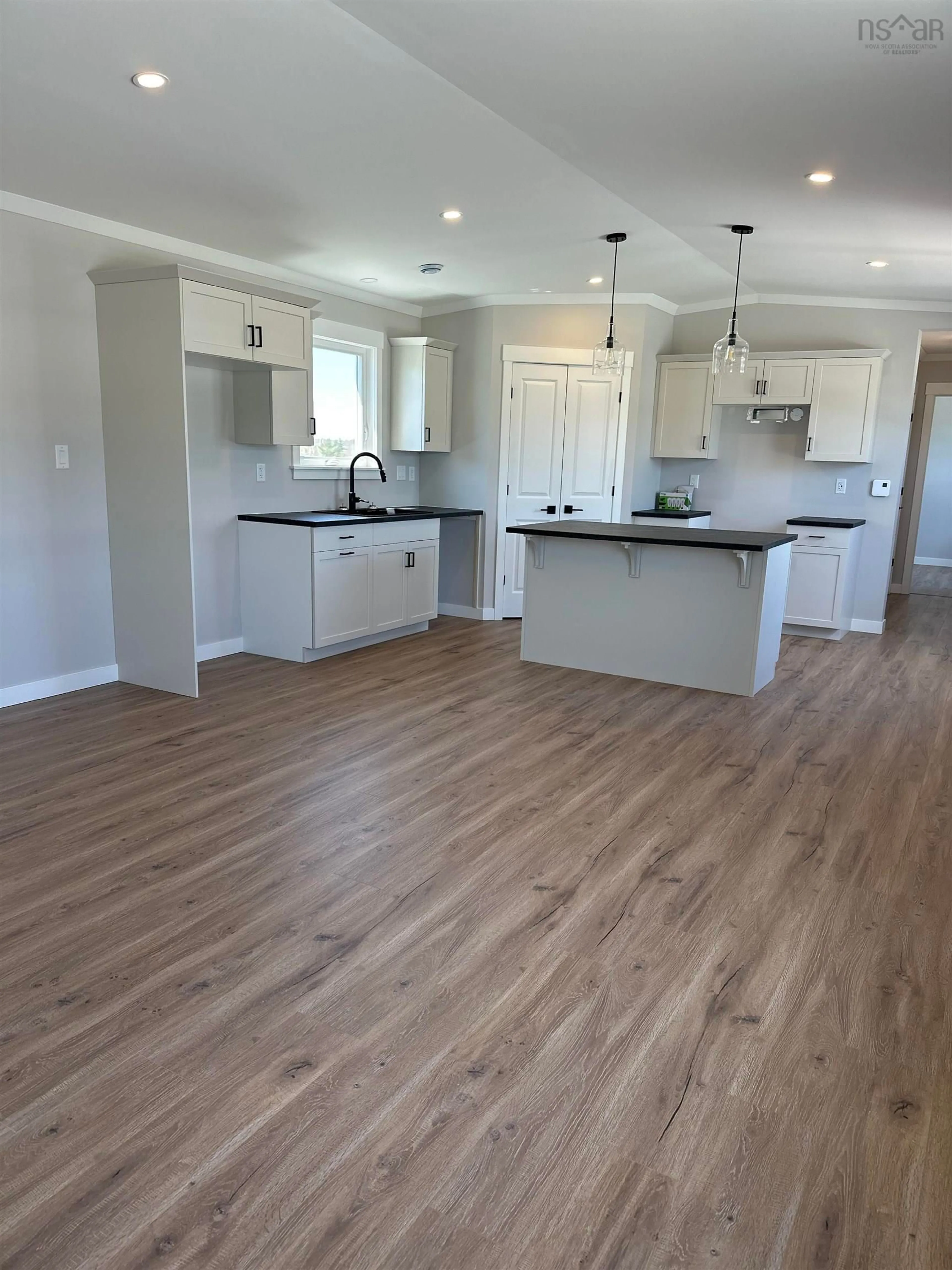 Open concept kitchen, wood/laminate floor for 501 Ludlow Crt #Lot 501, Elmsdale Nova Scotia B2S 0H4