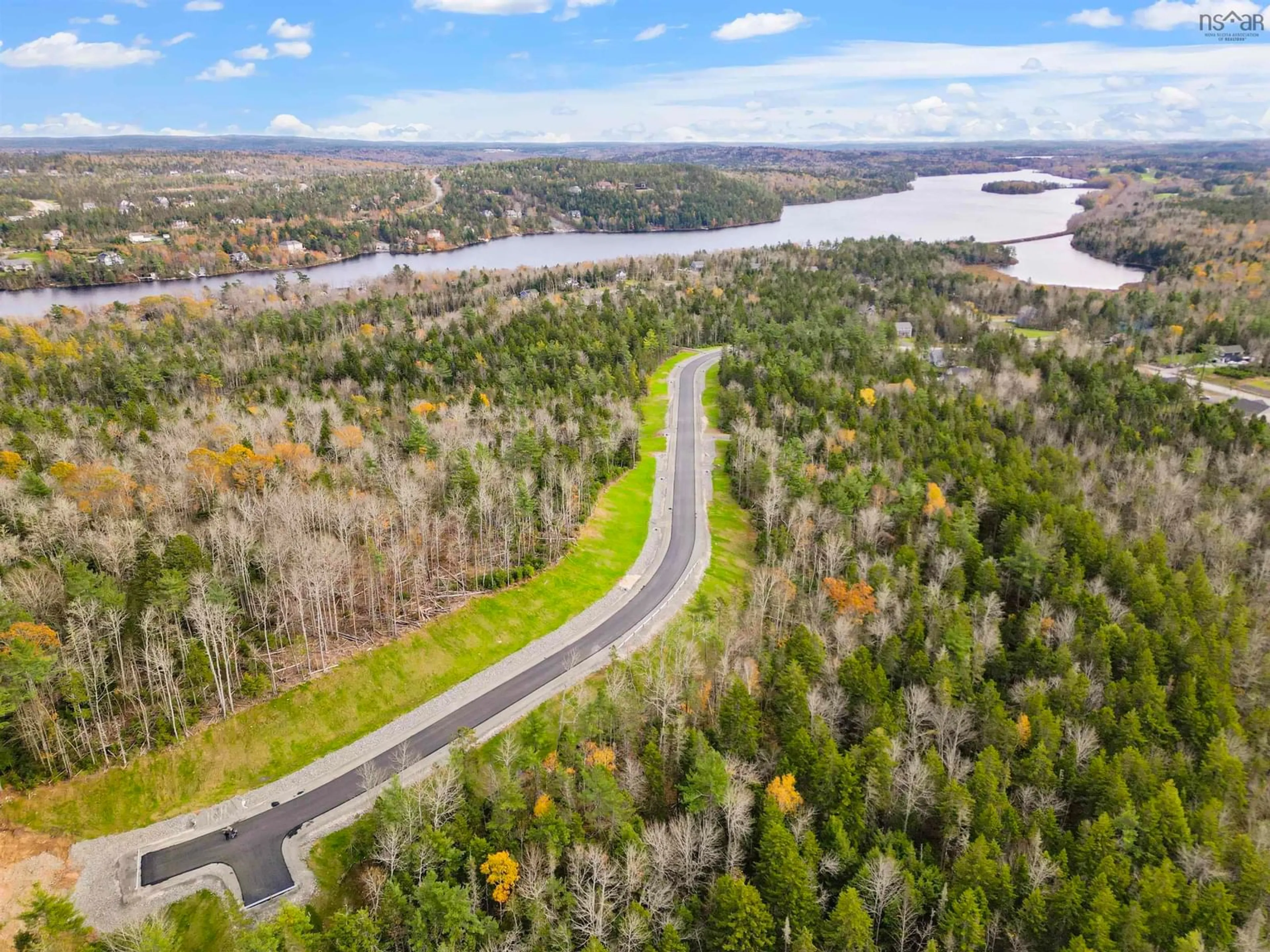 A pic from outside/outdoor area/front of a property/back of a property/a pic from drone, water/lake/river/ocean view for 37 Quail Ridge, Beaver Bank Nova Scotia B4G 0C8