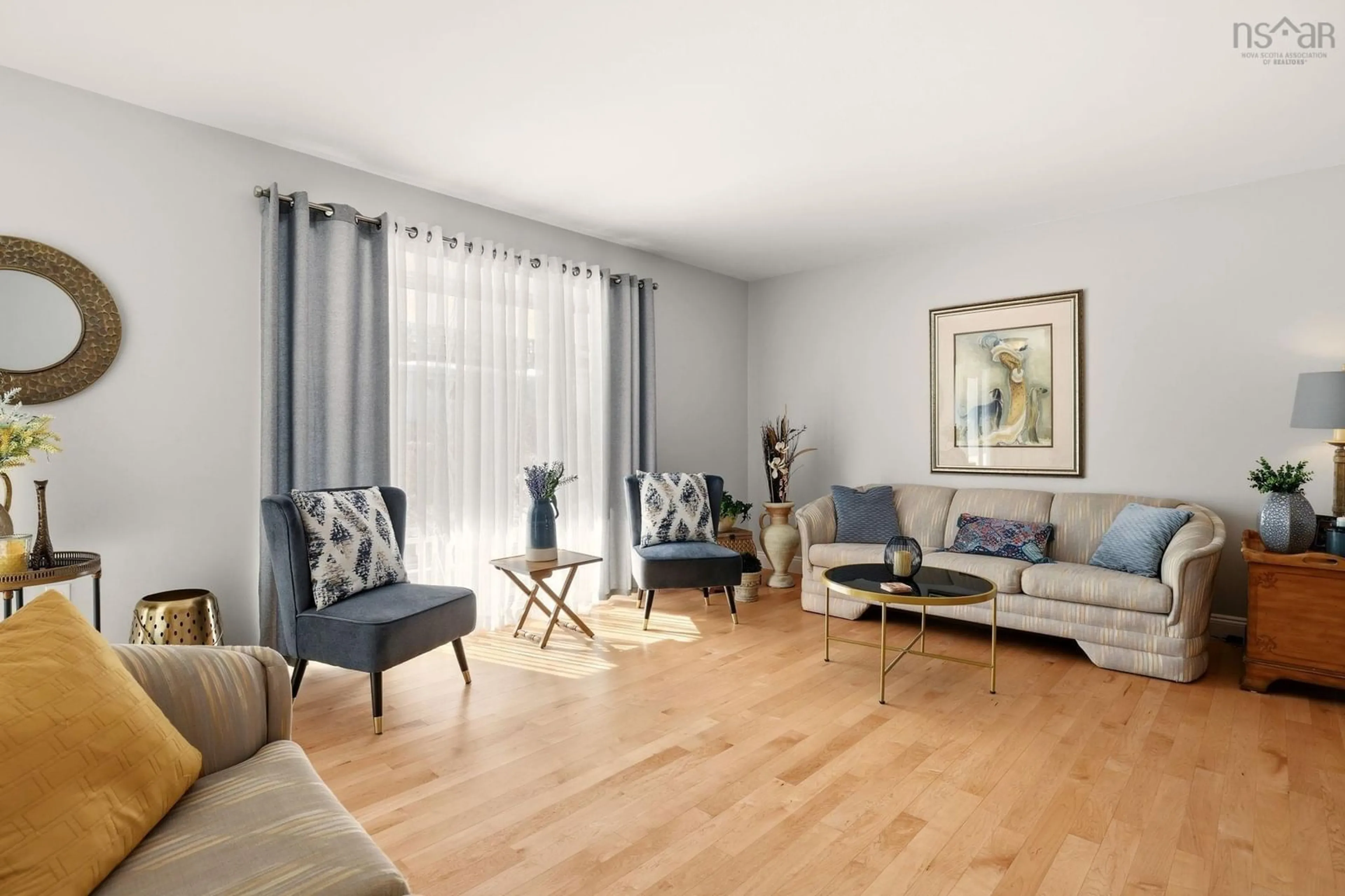 Living room with furniture, wood/laminate floor for 225 Cavalier Dr, Sackville Nova Scotia B4C 3L1