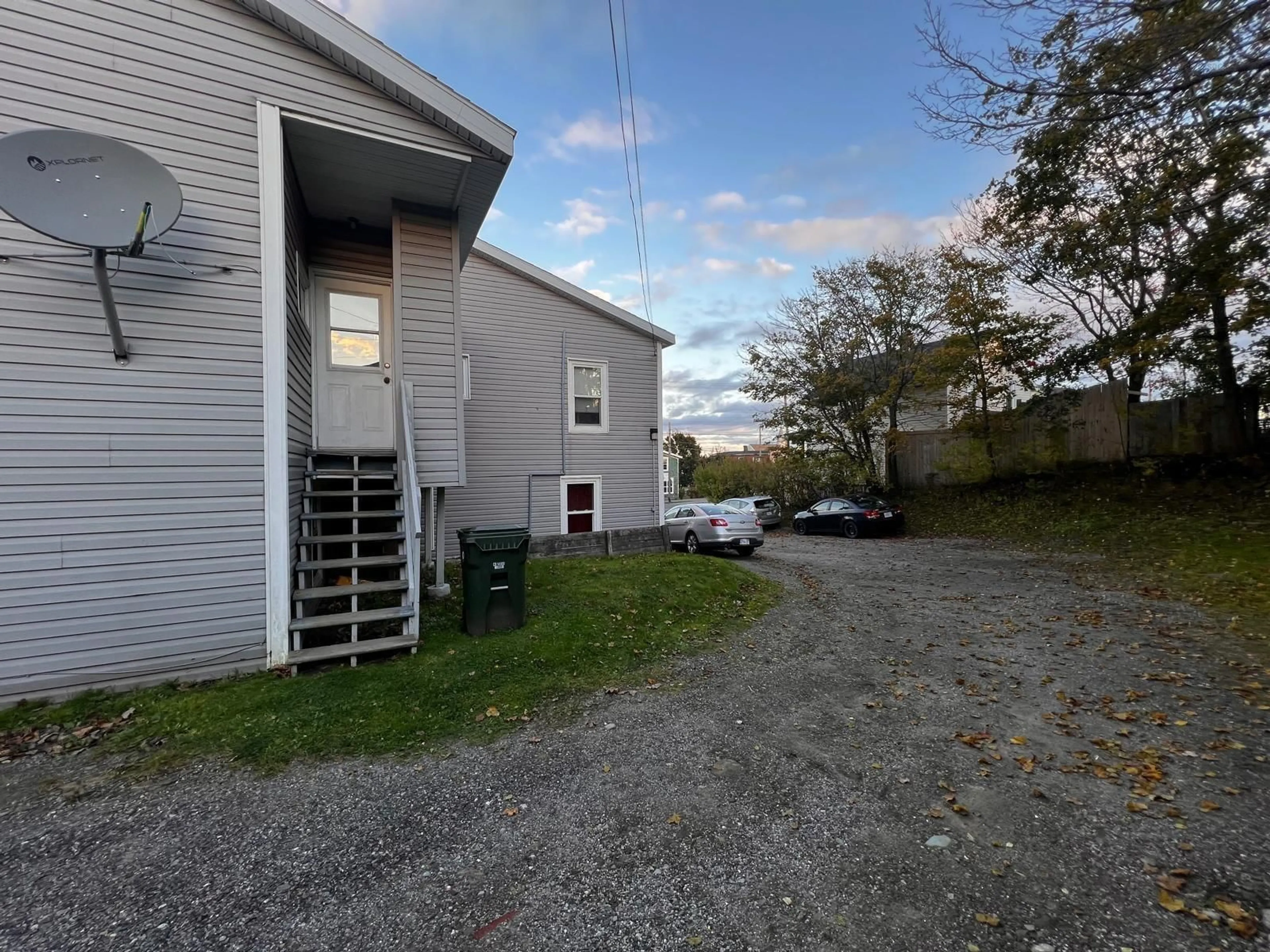 A pic from outside/outdoor area/front of a property/back of a property/a pic from drone, water/lake/river/ocean view for 971 Victoria Rd, Sydney Nova Scotia B1N 1K6