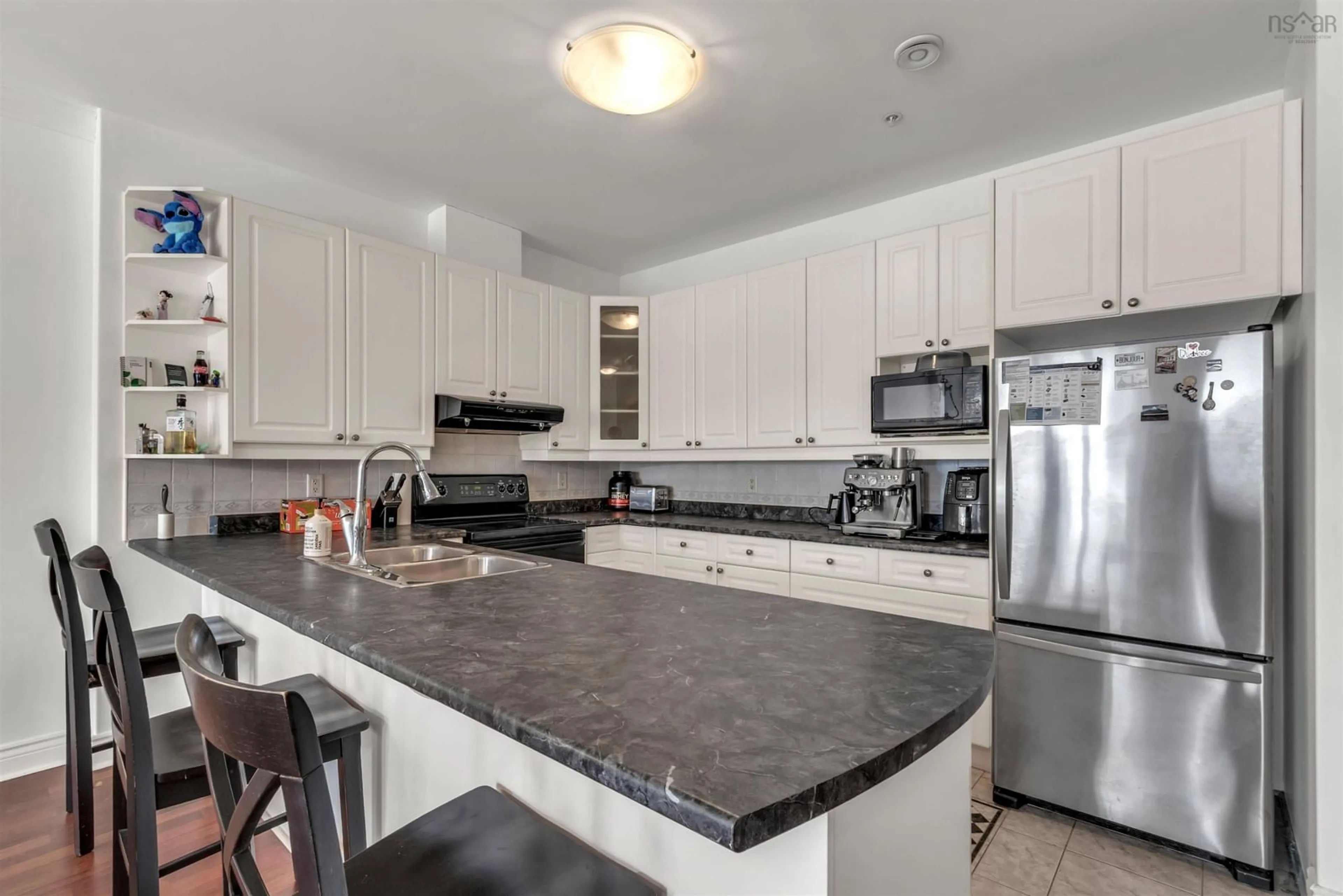 Open concept kitchen, ceramic/tile floor for 53 Bedros Lane #601, Bedford Nova Scotia B3M 4X4