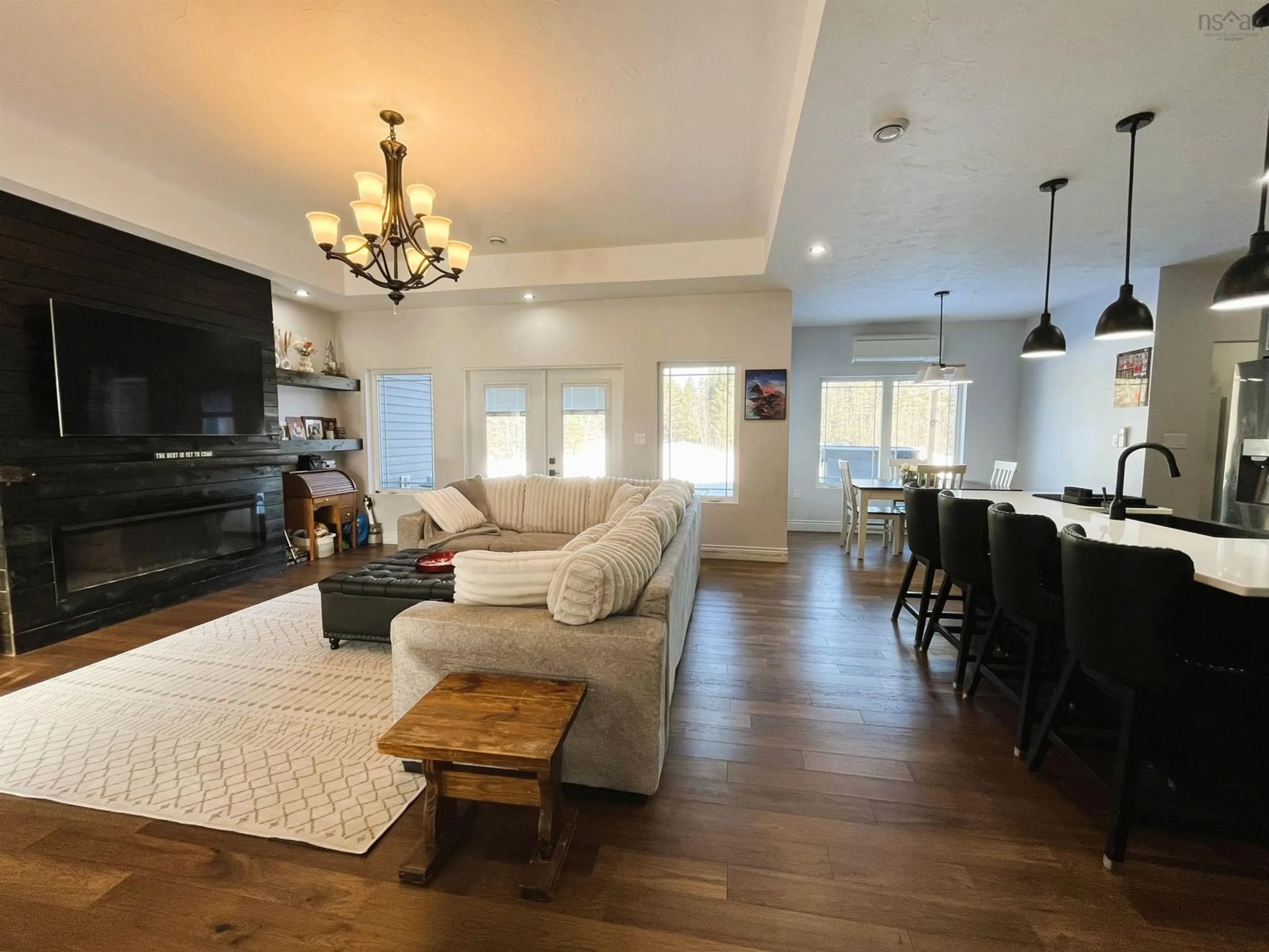 Living room with furniture, wood/laminate floor for 27 Molly Lane, Brookdale Nova Scotia B4H 3Y1