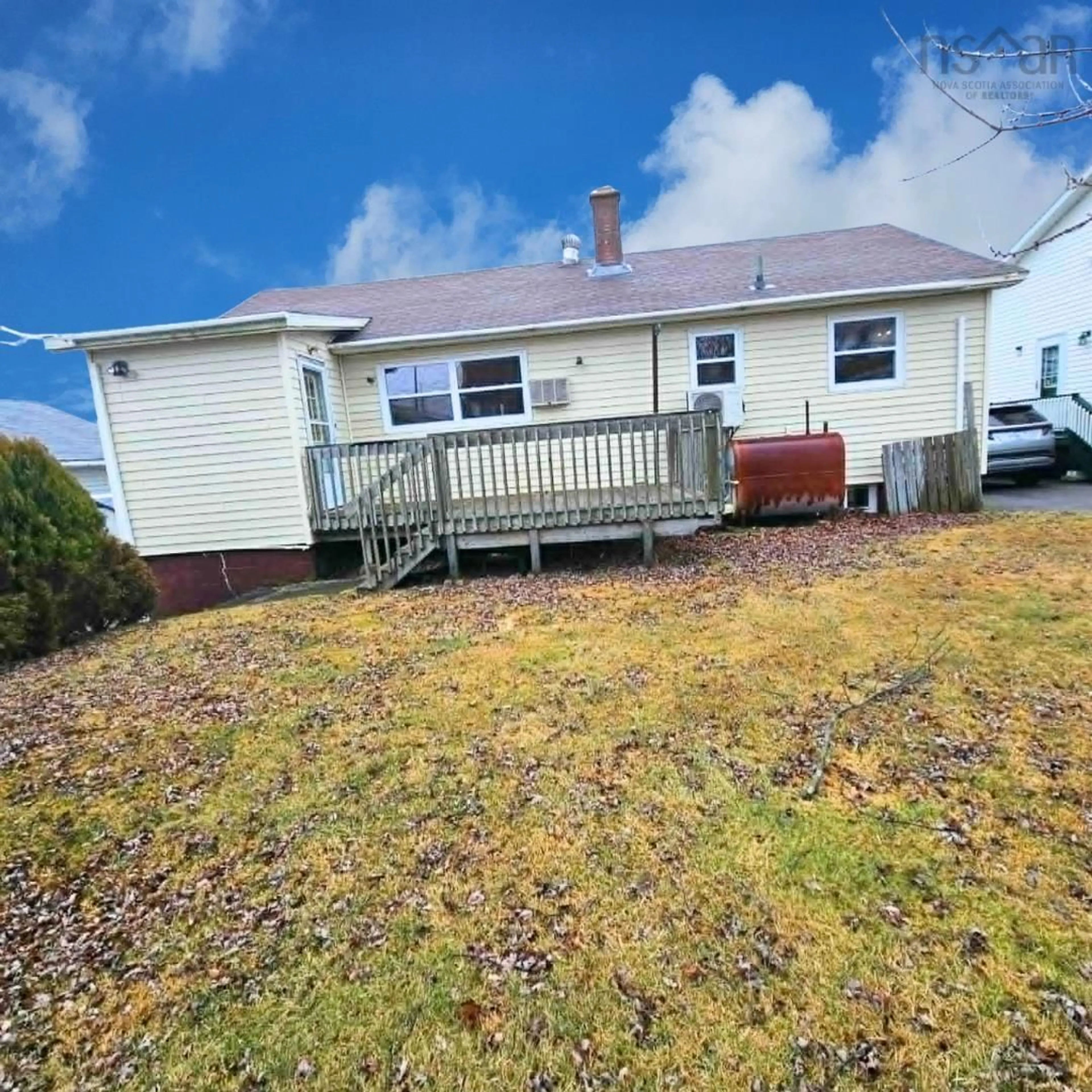 A pic from outside/outdoor area/front of a property/back of a property/a pic from drone, street for 292 Cherry St, Sydney Nova Scotia B1P 3V1