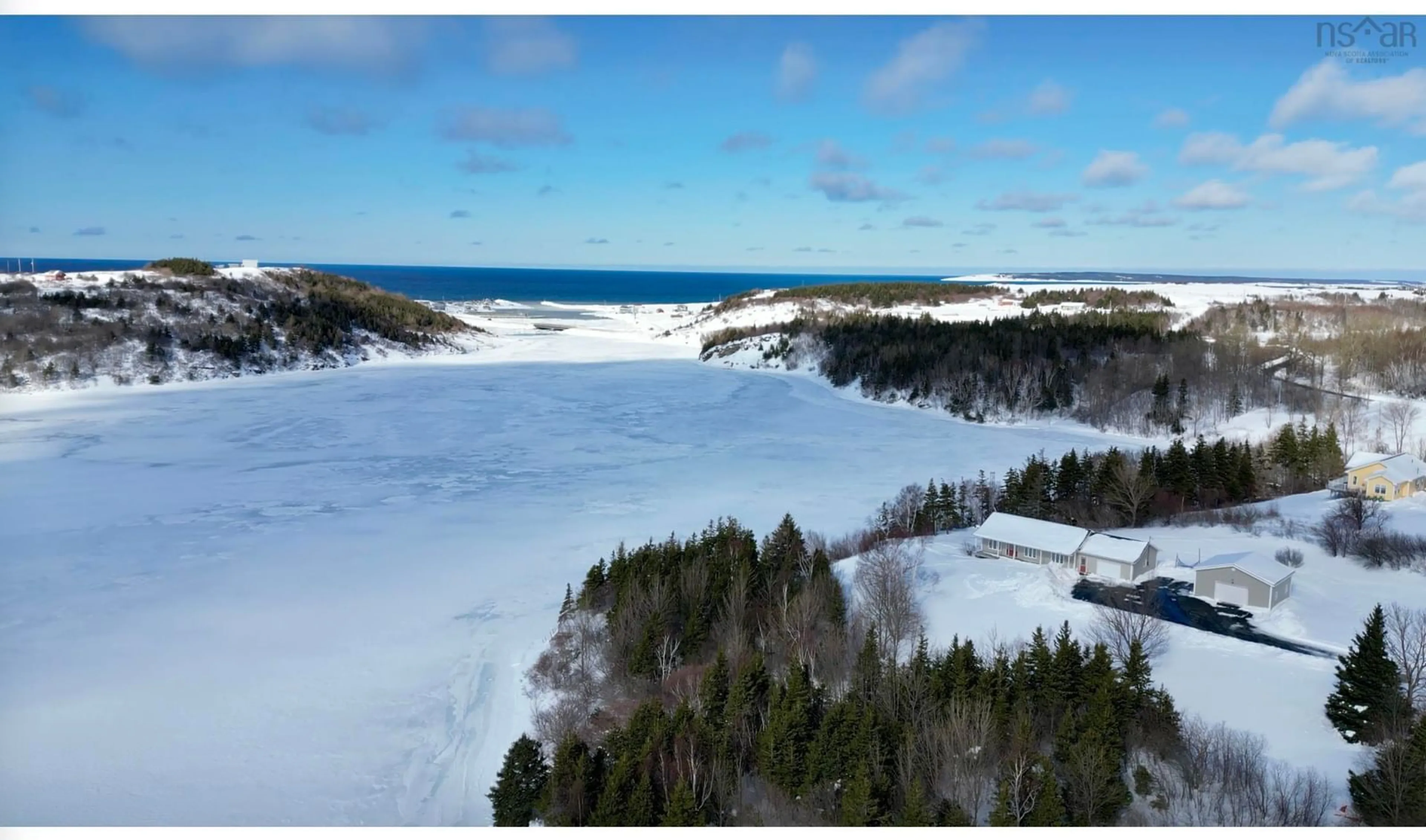 A pic from outside/outdoor area/front of a property/back of a property/a pic from drone, water/lake/river/ocean view for 1279 Macgarry Road, Grand Étang Nova Scotia B0E 1L0