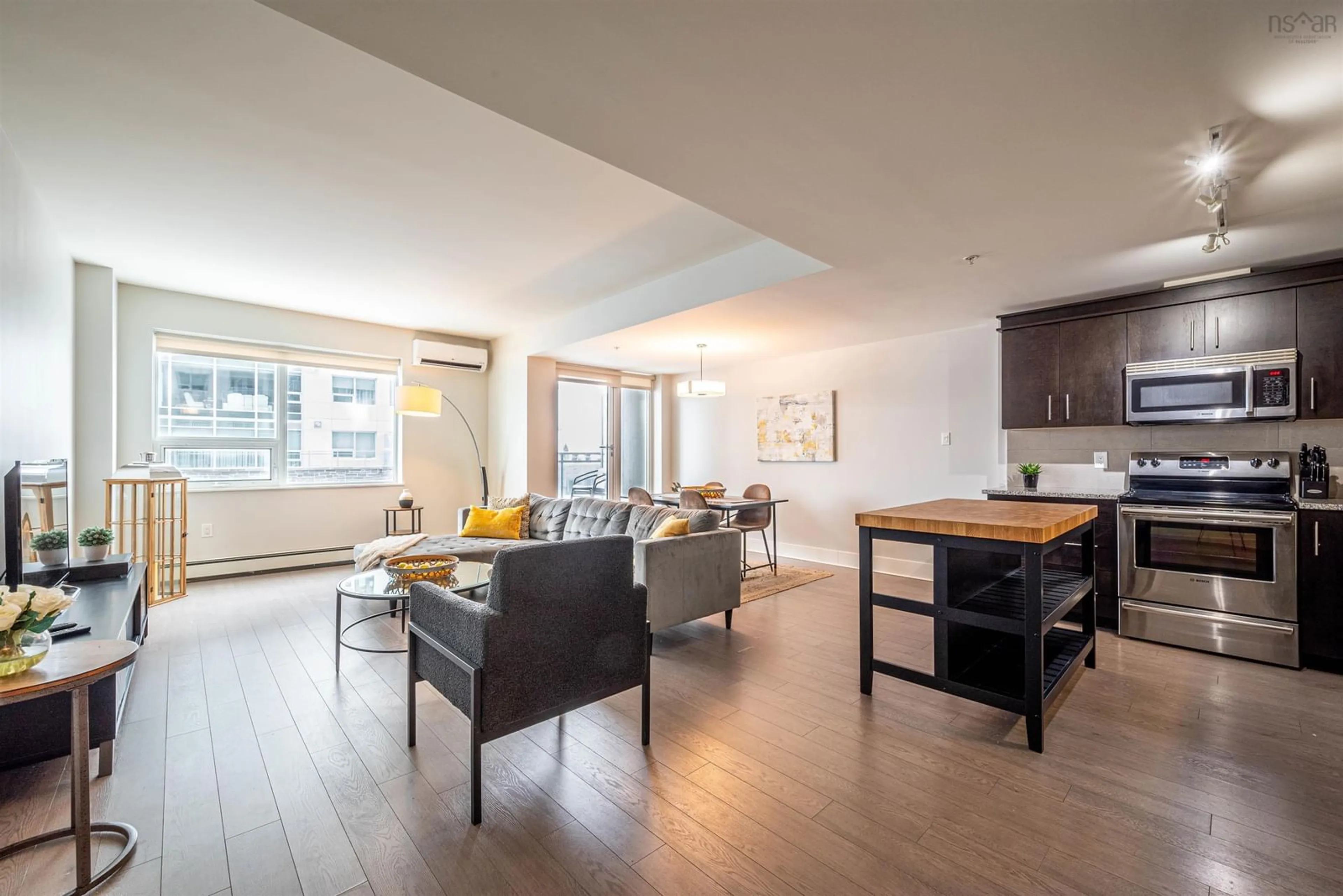 Living room with furniture, wood/laminate floor for 15 Kings Wharf Pl #403, Dartmouth Nova Scotia B2Y 0C2