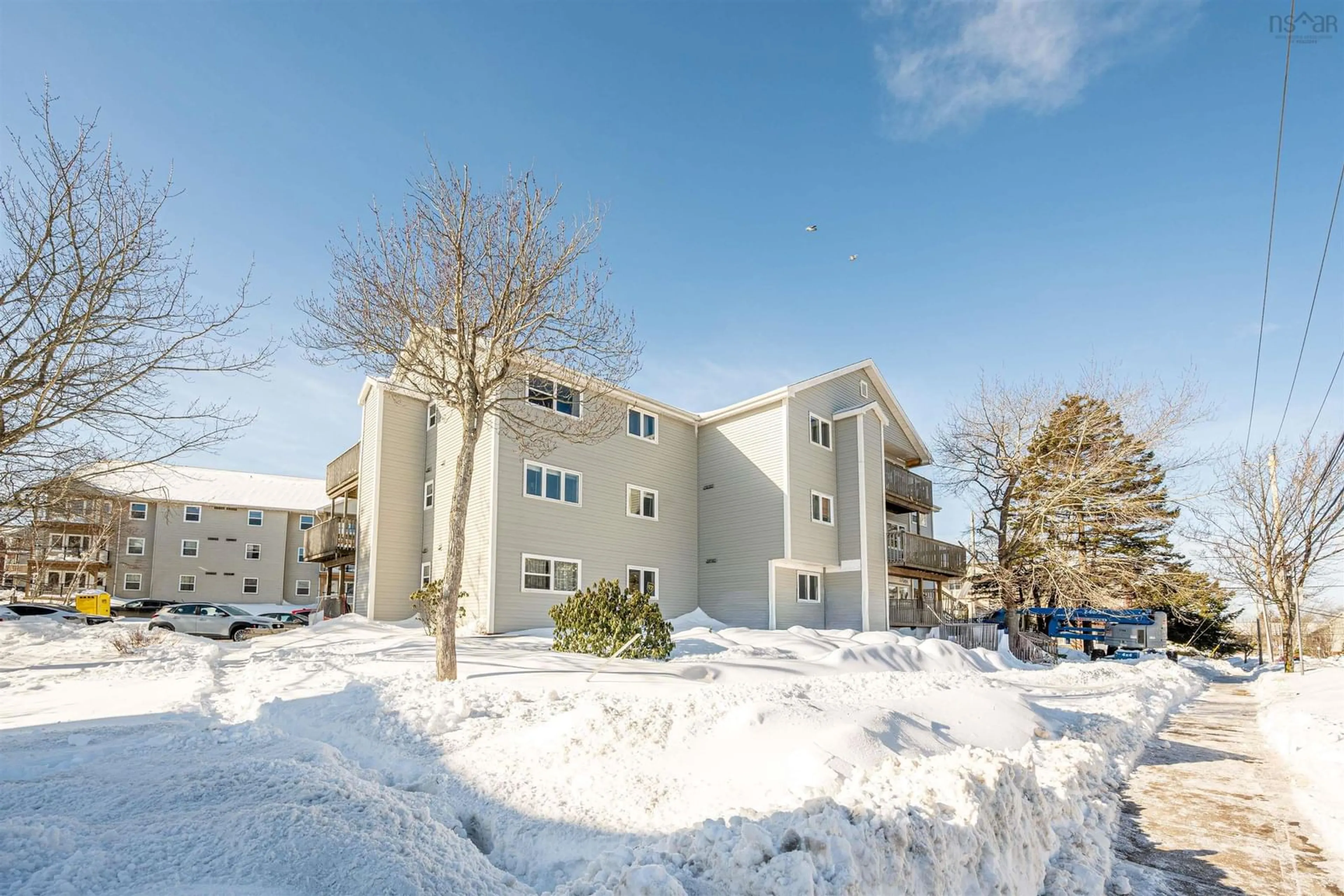 A pic from outside/outdoor area/front of a property/back of a property/a pic from drone, building for 182 Farnham Gate Rd #204, Halifax Nova Scotia B3M 4C4