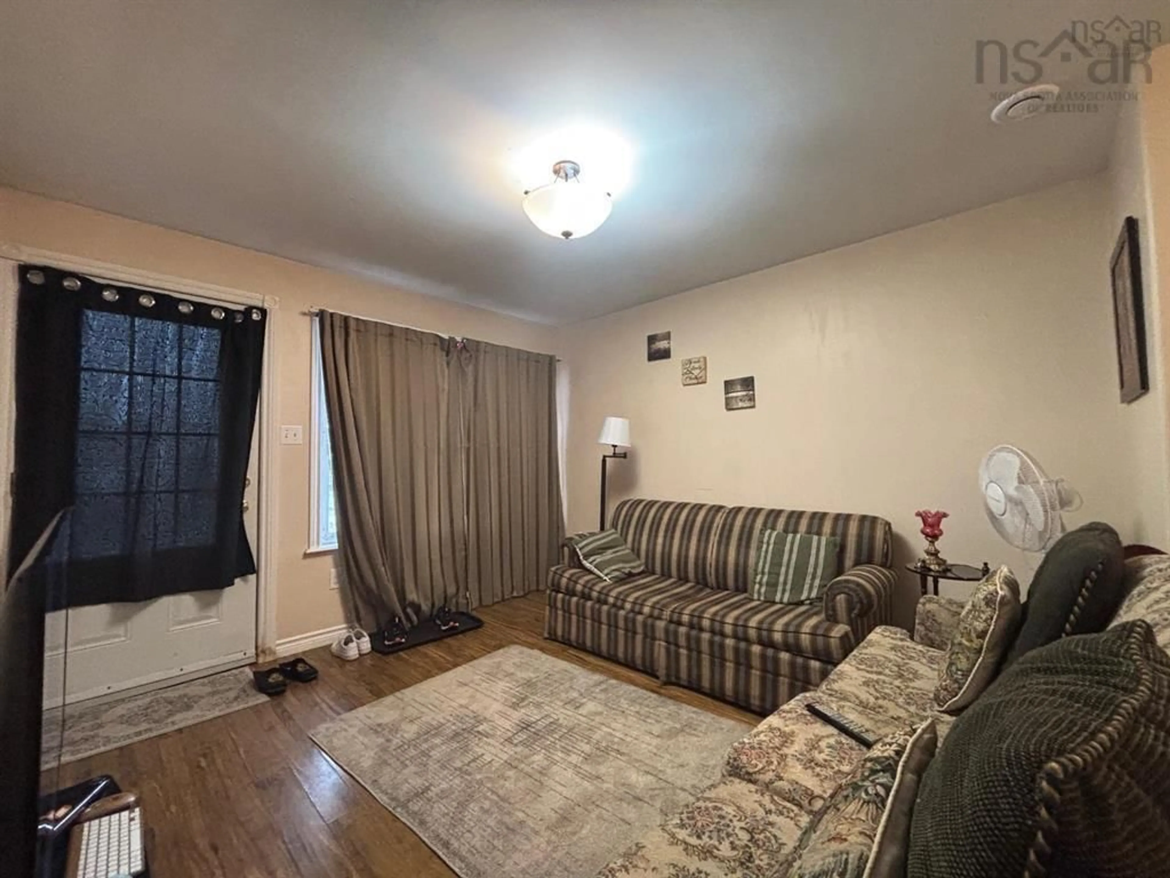 Living room with furniture, unknown for 272/274 York Street, Glace Bay Nova Scotia B1A 2M3