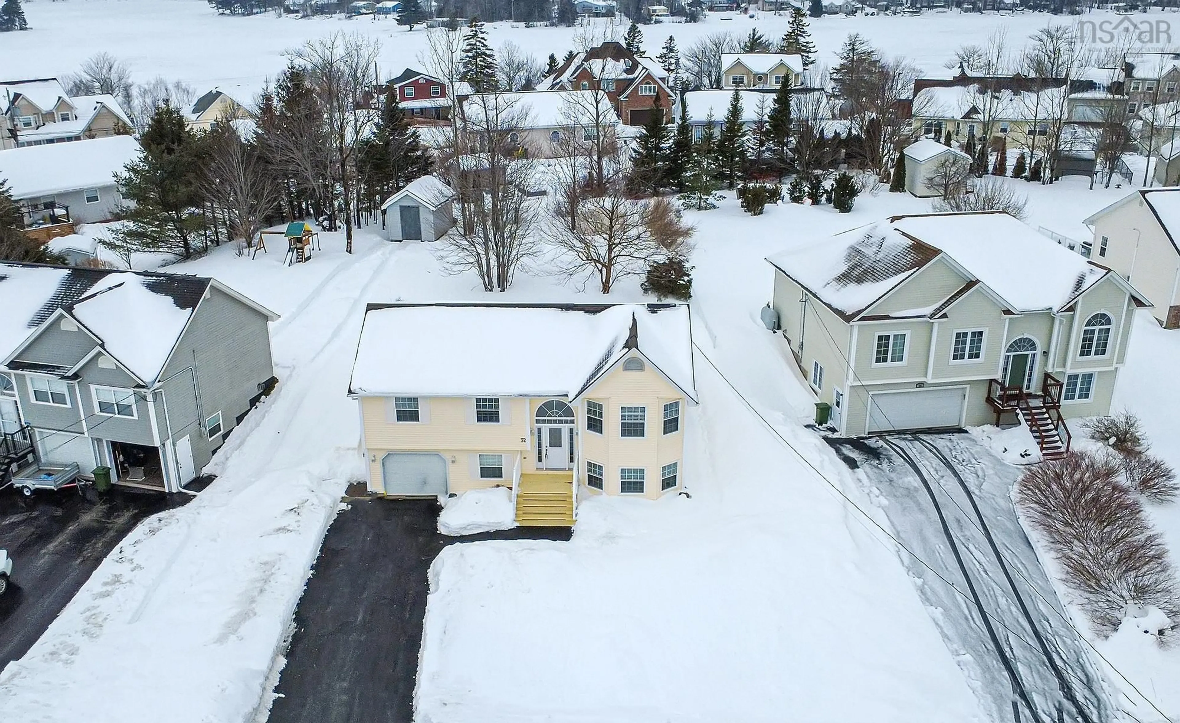 A pic from outside/outdoor area/front of a property/back of a property/a pic from drone, street for 32 Falcon Crest Crt, Middle Sackville Nova Scotia B4E 3B1