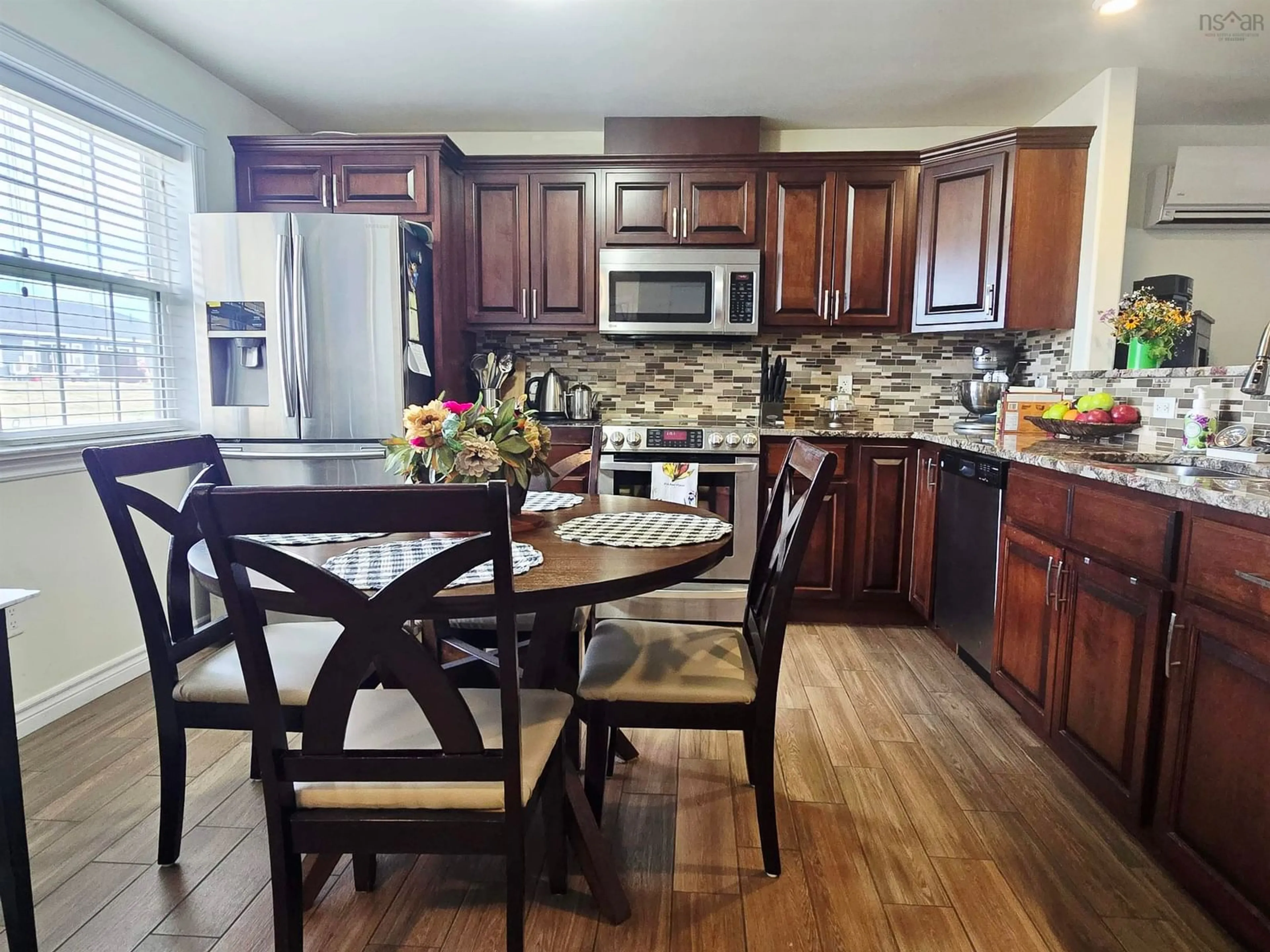 Open concept kitchen, wood/laminate floor for 144 Norway Point Rd, Pictou Nova Scotia B0K 1H0