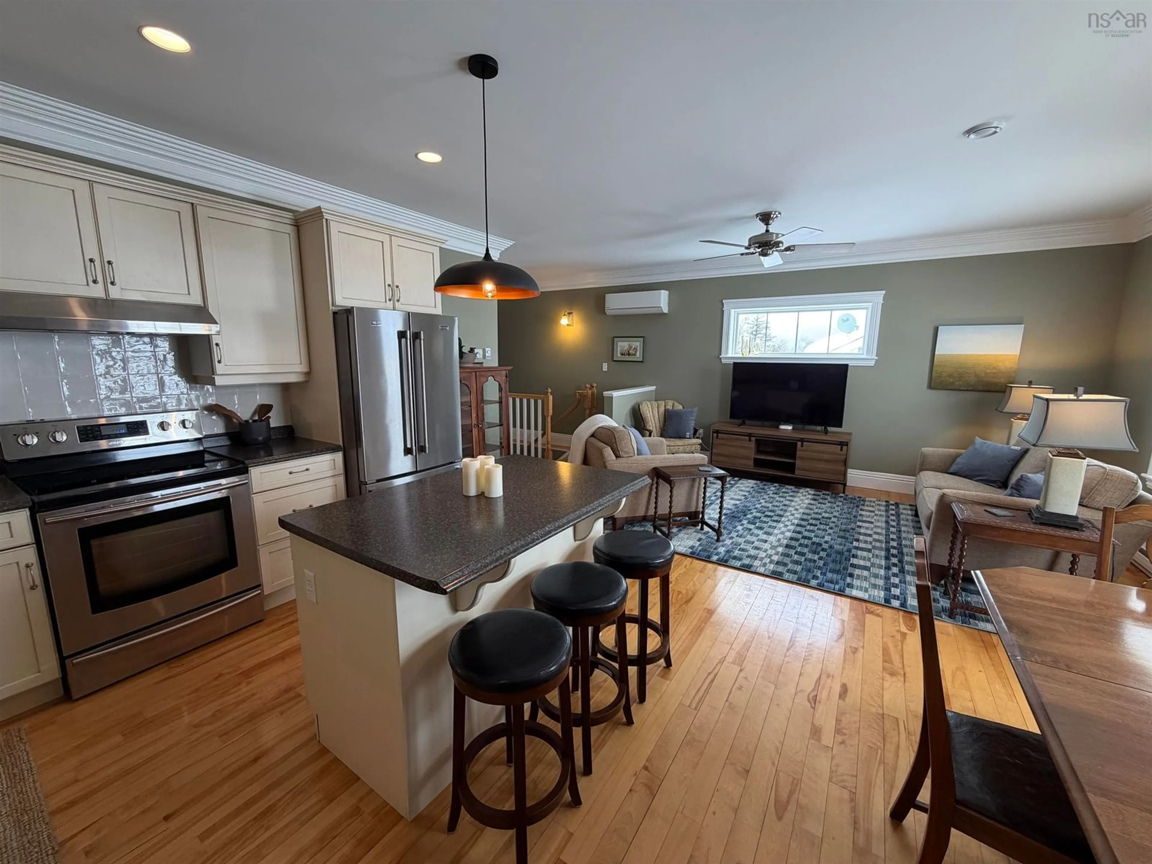 Open concept kitchen, wood/laminate floor for 57 Vincents Way #5, Antigonish Nova Scotia B2G 2X3