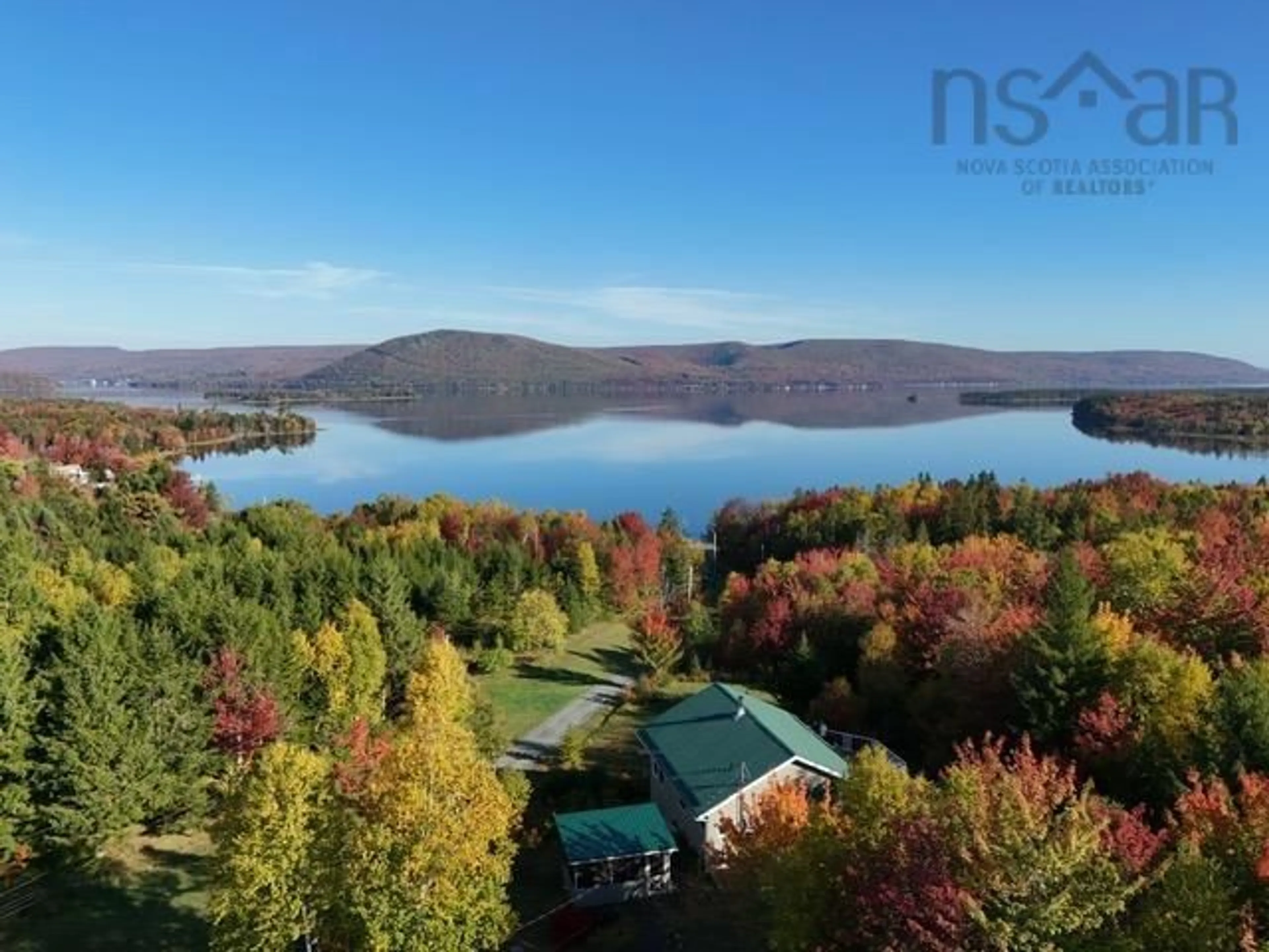 A pic from outside/outdoor area/front of a property/back of a property/a pic from drone, water/lake/river/ocean view for 692 Portage Rd, Wilburn Nova Scotia B0E 2K0