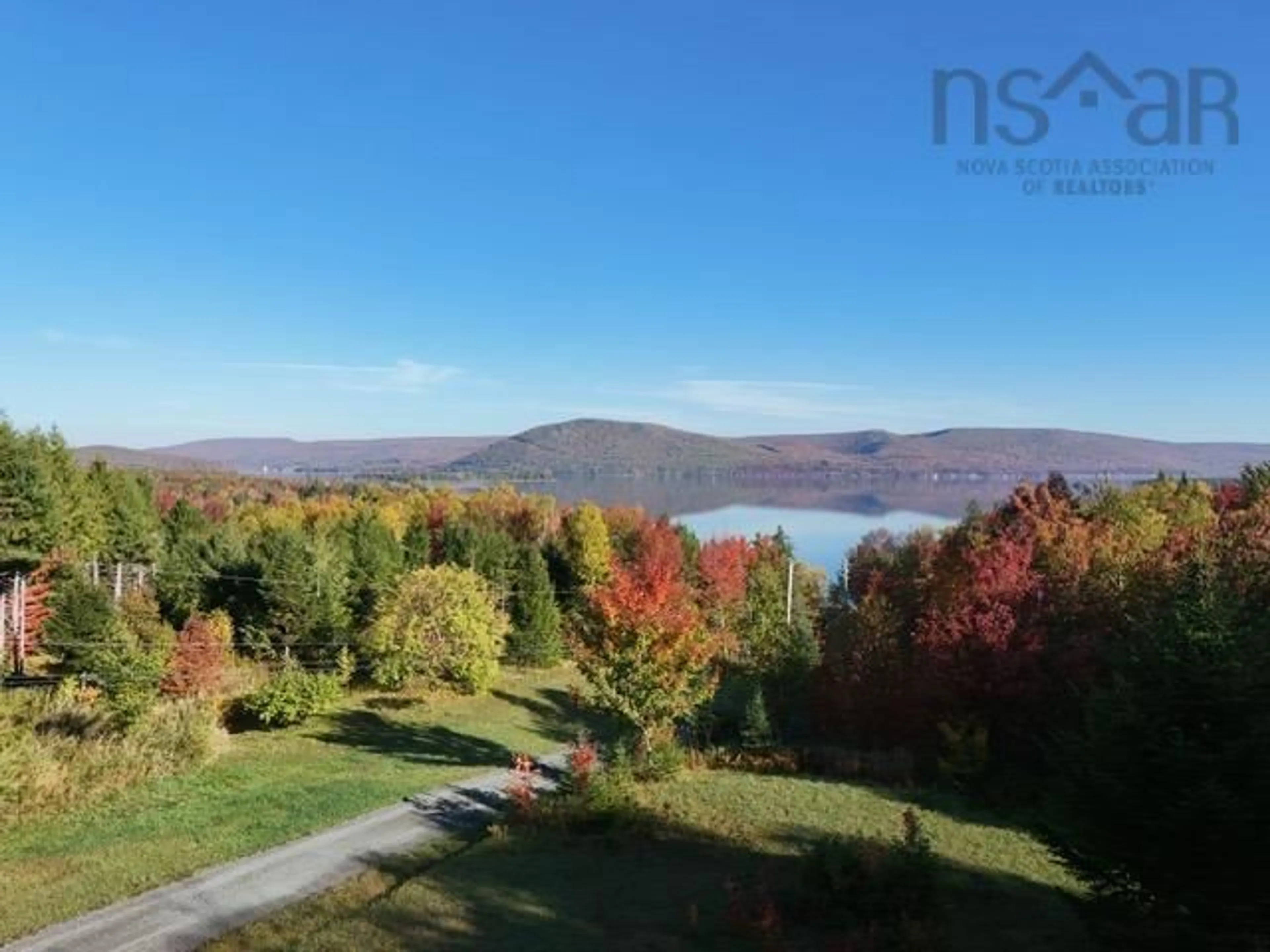 A pic from outside/outdoor area/front of a property/back of a property/a pic from drone, water/lake/river/ocean view for 692 Portage Rd, Wilburn Nova Scotia B0E 2K0