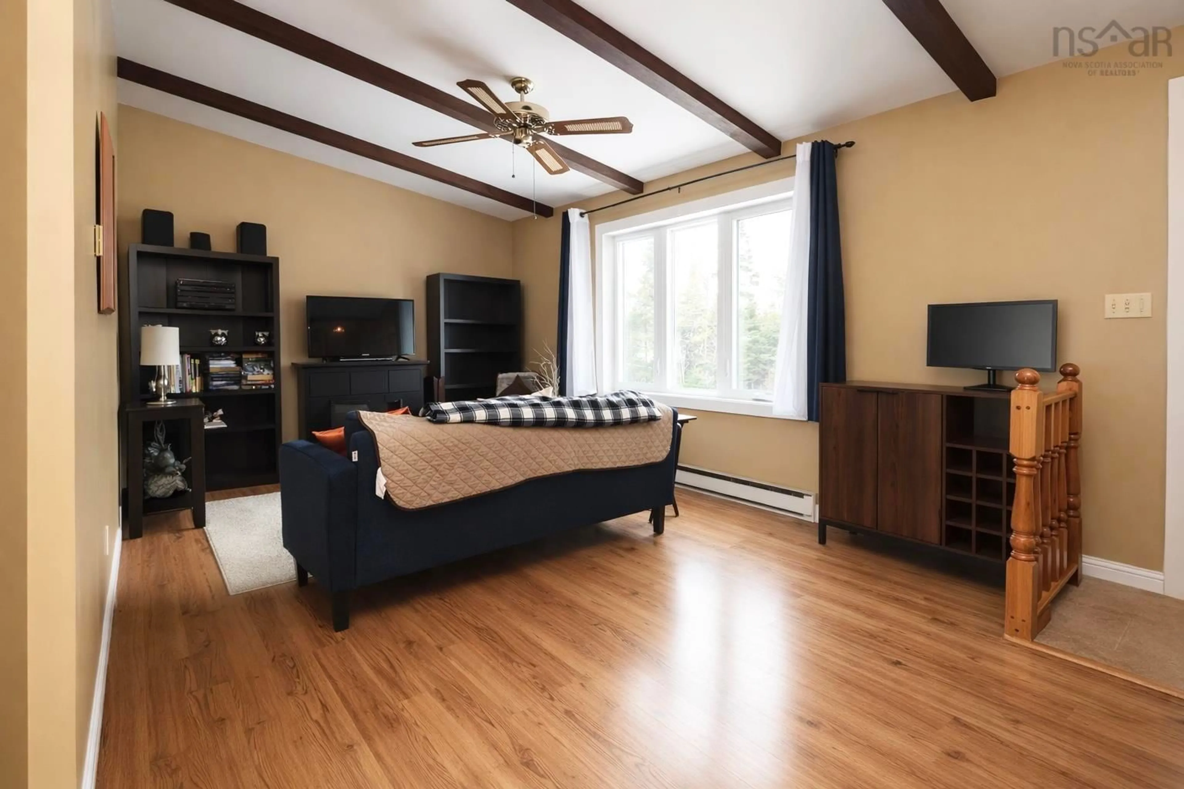 Living room with furniture, wood/laminate floor for 1 Oakridge Dr, Brookside Nova Scotia B3T 1S8