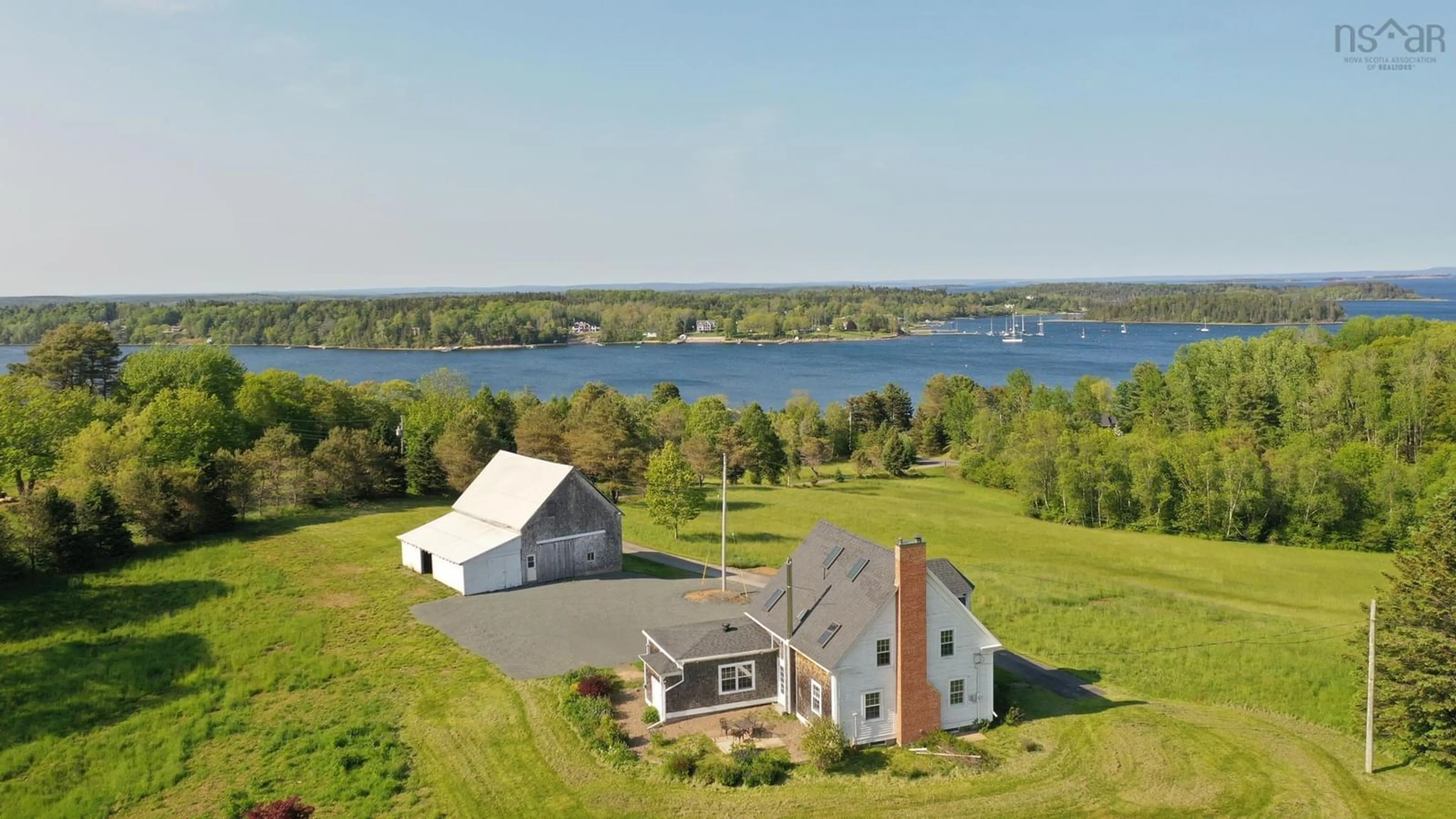 A pic from outside/outdoor area/front of a property/back of a property/a pic from drone, water/lake/river/ocean view for 236 Princes Inlet Dr, Martins Brook Nova Scotia B0J 2C0