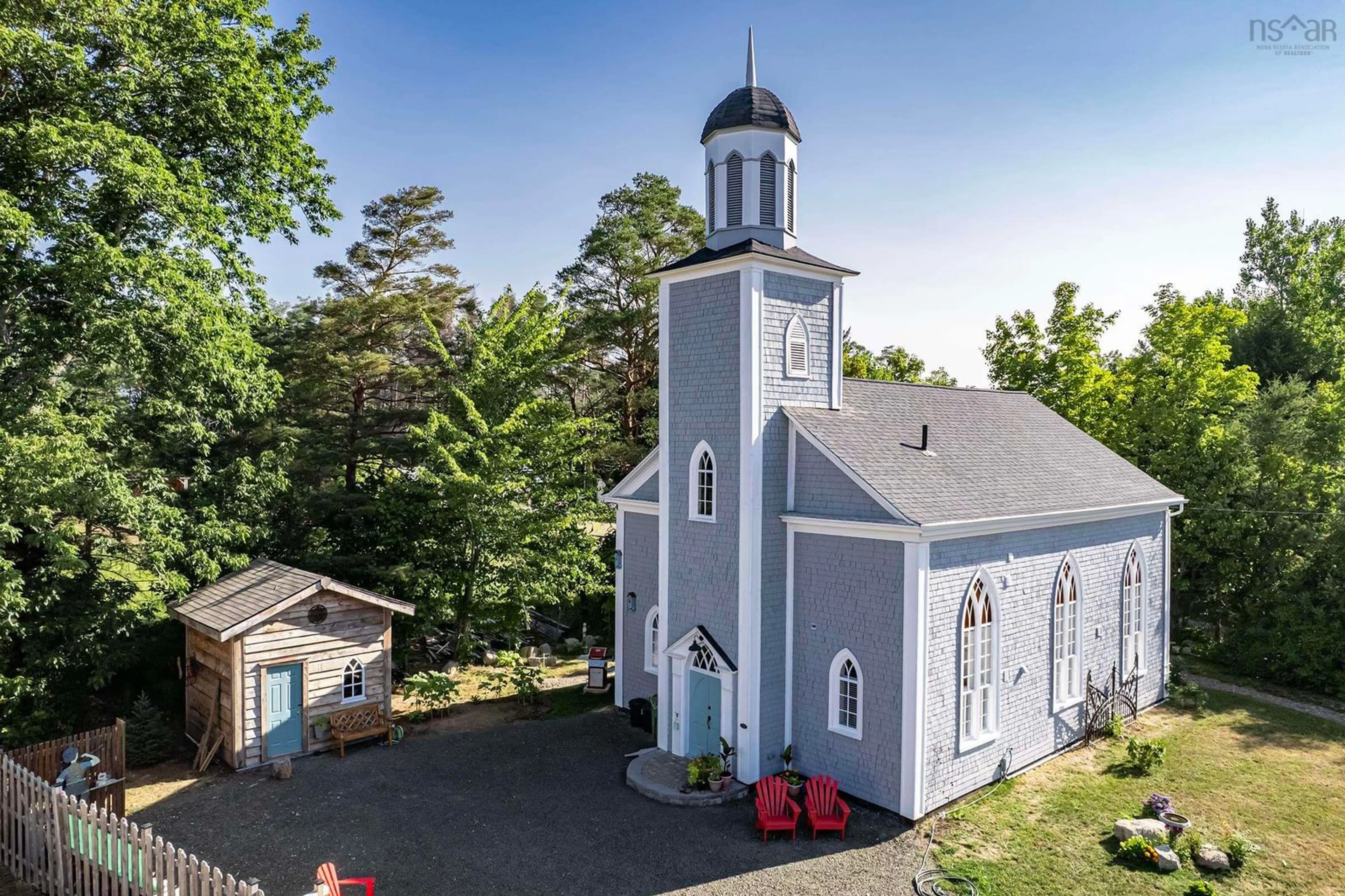 A pic from outside/outdoor area/front of a property/back of a property/a pic from drone, building for 579 Main St, Lawrencetown Nova Scotia B0S 1M0