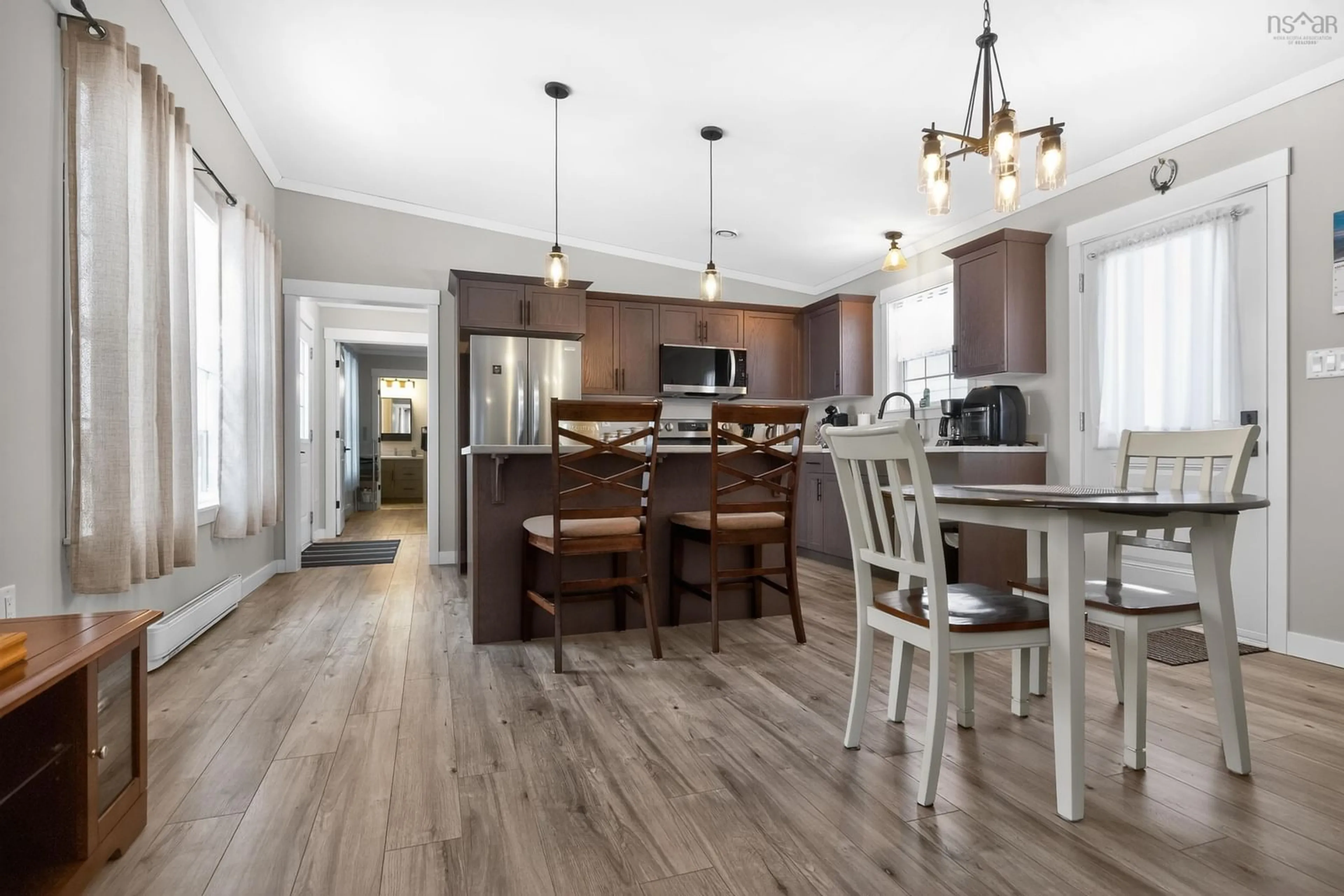 Open concept kitchen, wood/laminate floor for 82 Sunrise Crt, Upper Onslow Nova Scotia B6L 0E9