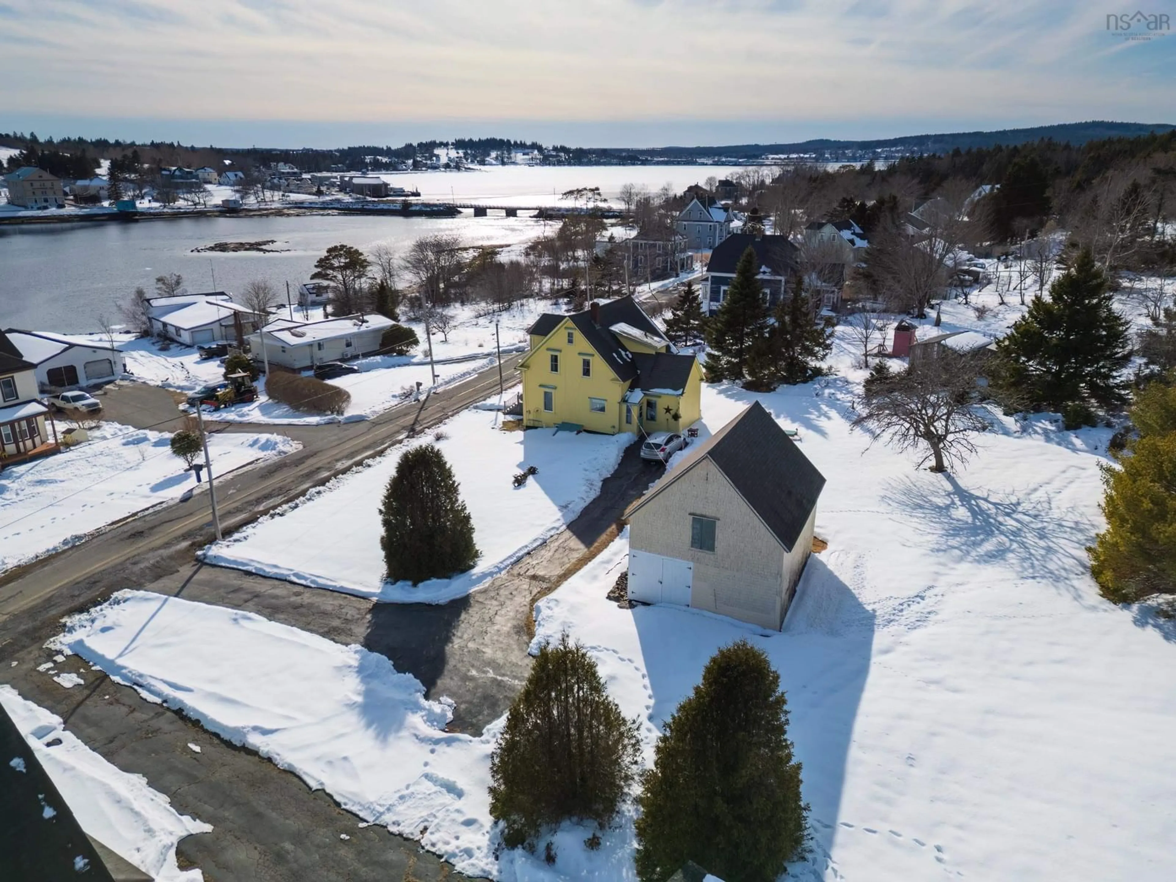 A pic from outside/outdoor area/front of a property/back of a property/a pic from drone, water/lake/river/ocean view for 210 North Side Rd, Riverport Nova Scotia B0J 2W0
