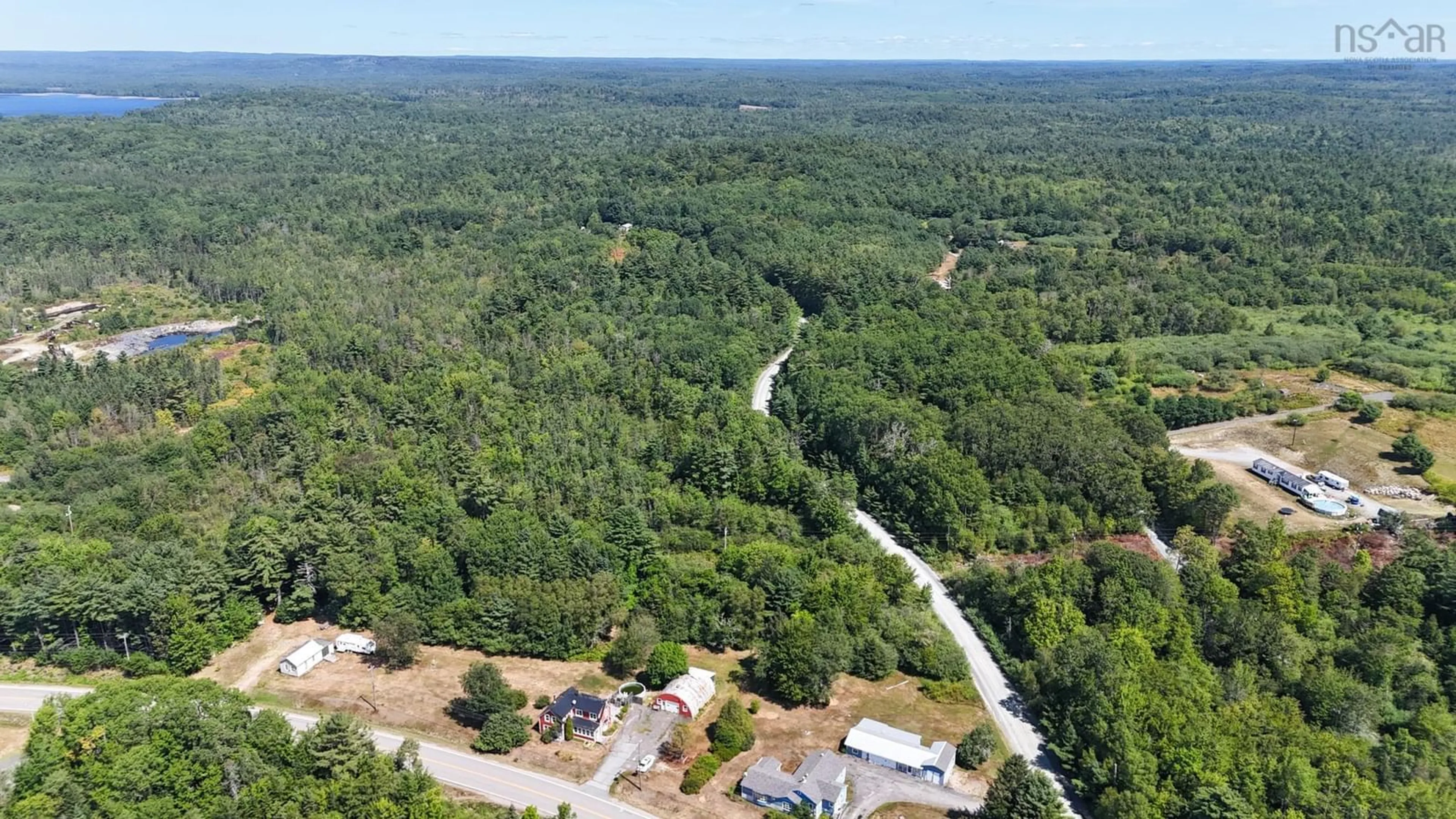 A pic from outside/outdoor area/front of a property/back of a property/a pic from drone, forest/trees view for 10524 Highway 8, Harmony Mills Nova Scotia B0T 1B0