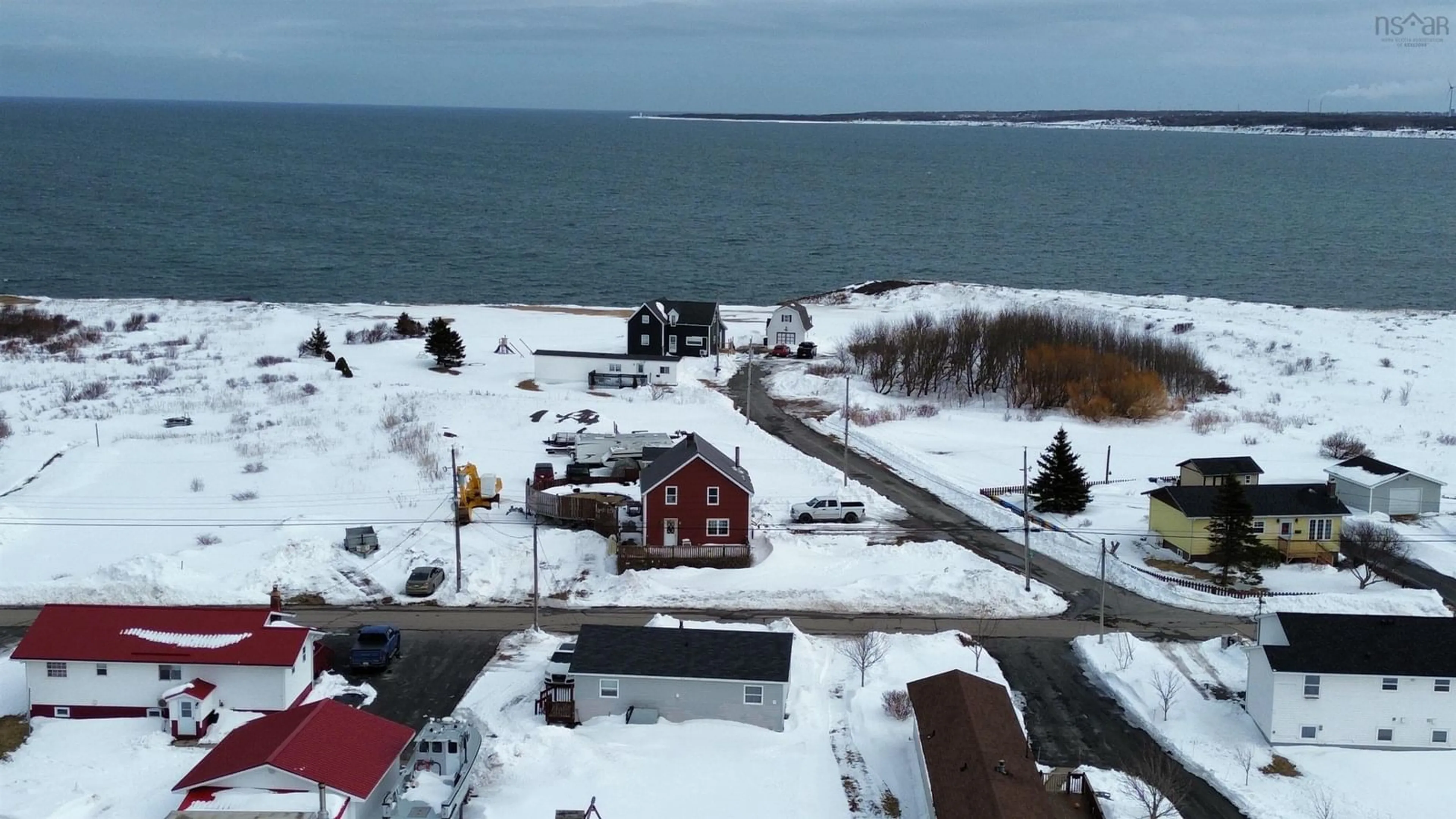 A pic from outside/outdoor area/front of a property/back of a property/a pic from drone, street for 19 Peck St, Sydney Mines Nova Scotia B1V 1V2