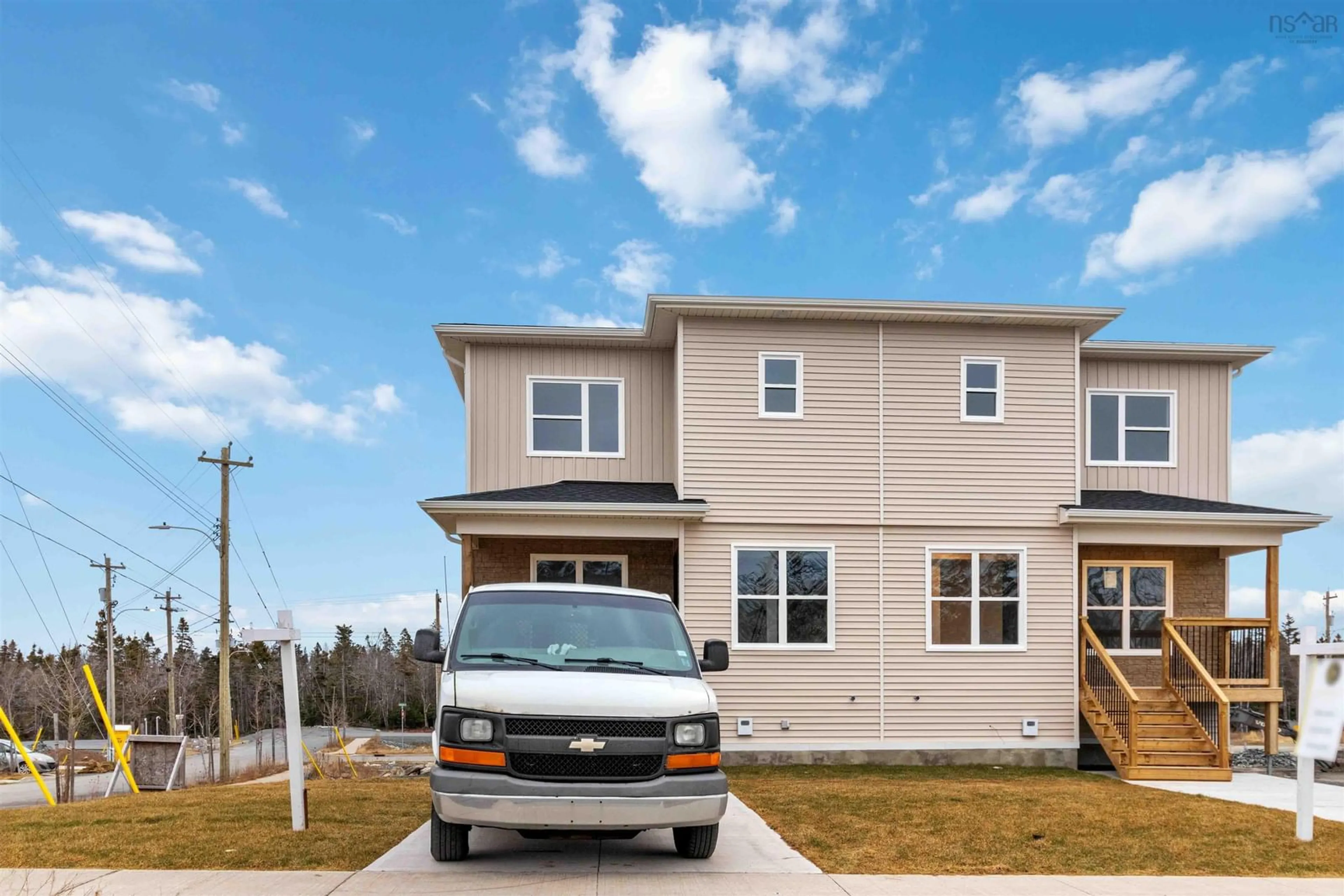 Home with vinyl exterior material, street for 4 Berm St, Spryfield Nova Scotia B3R 0H2
