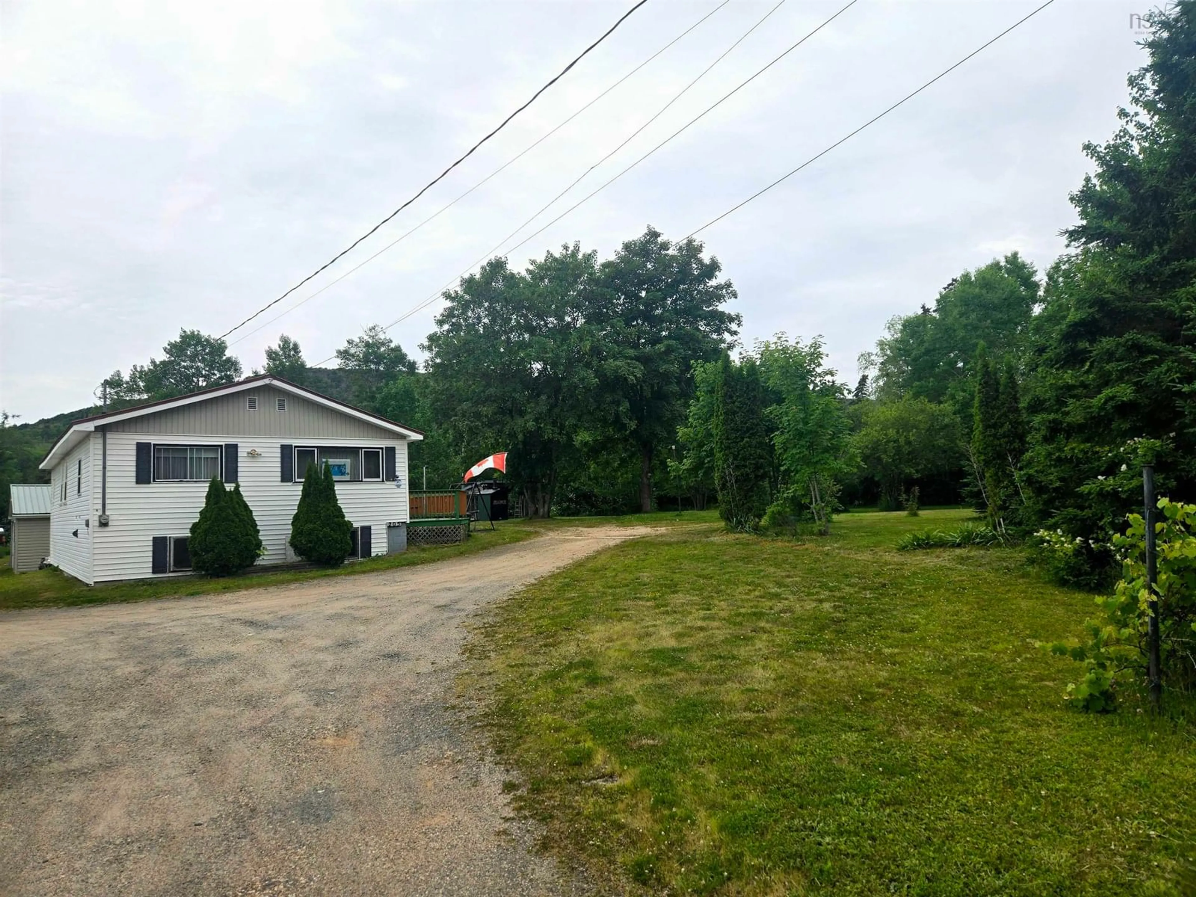 A pic from outside/outdoor area/front of a property/back of a property/a pic from drone, street for 205 Parker Mountain Rd, Granville Ferry Nova Scotia B0S 1A0