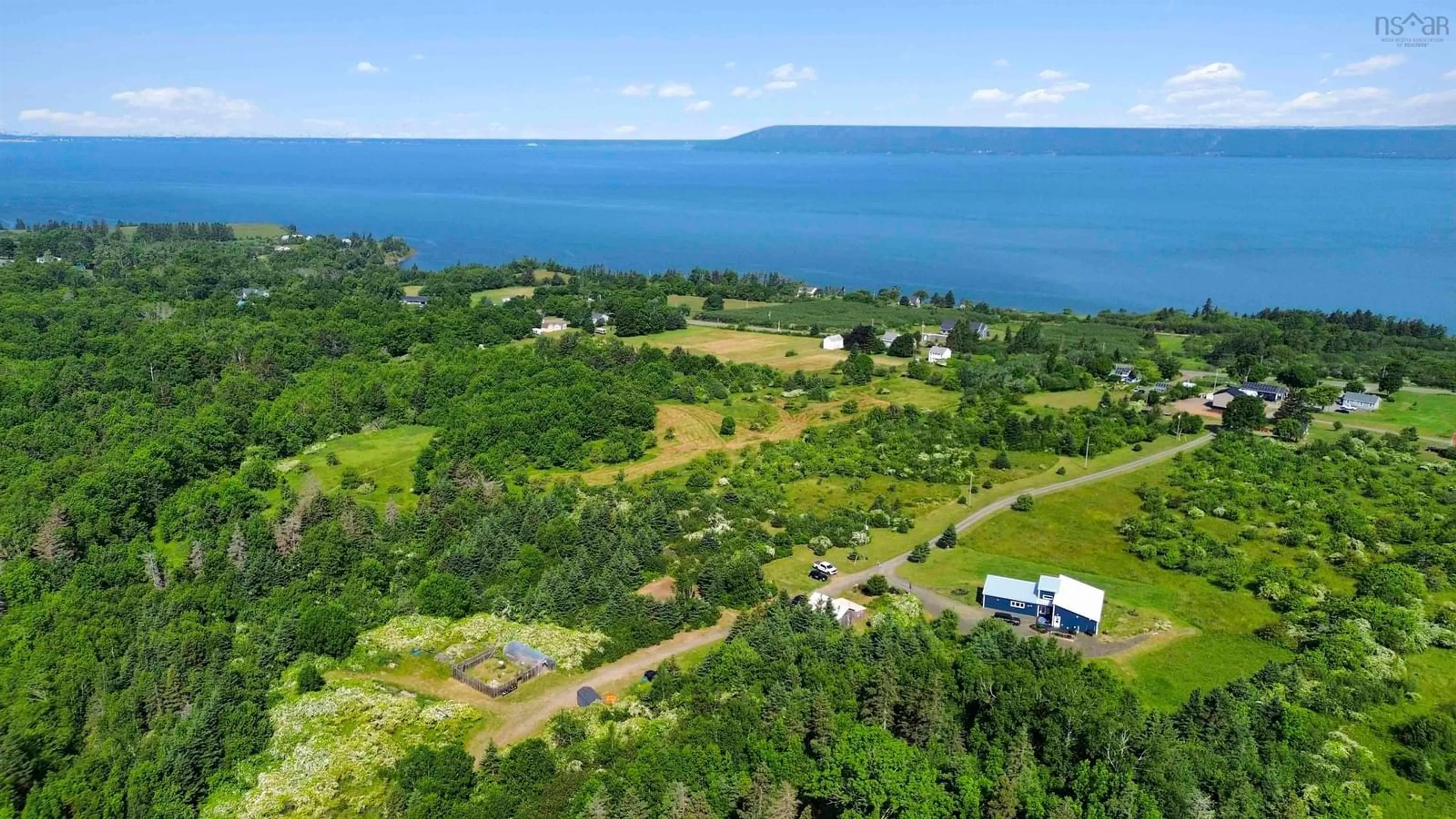 A pic from outside/outdoor area/front of a property/back of a property/a pic from drone, water/lake/river/ocean view for 59 Deep Brook Lane, Deep Brook Nova Scotia B0S 1J0