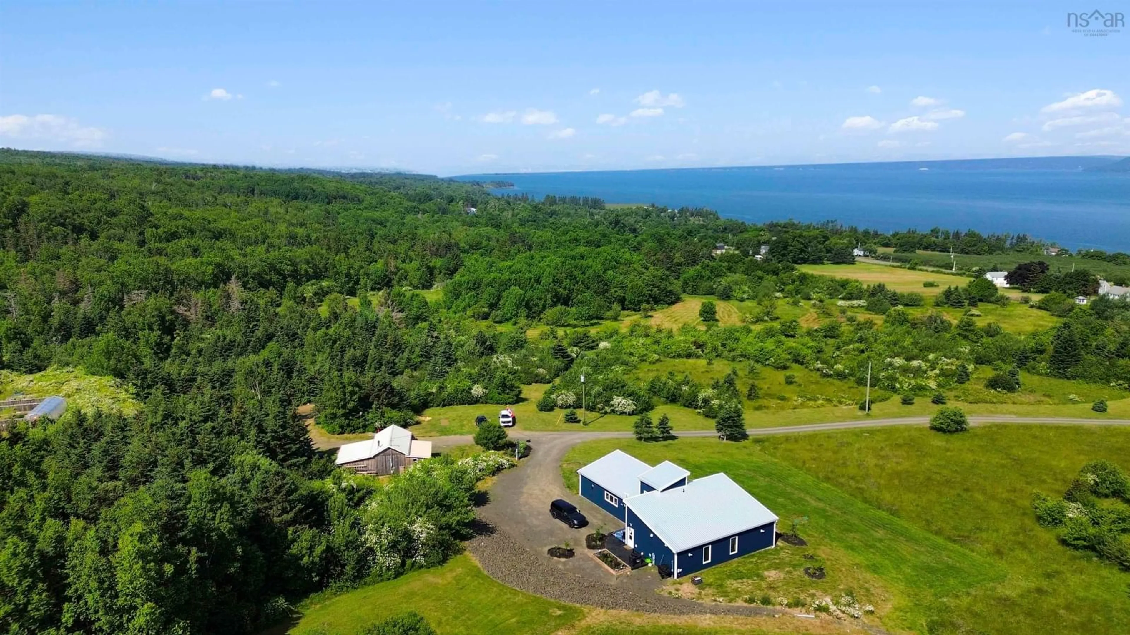 A pic from outside/outdoor area/front of a property/back of a property/a pic from drone, water/lake/river/ocean view for 59 Deep Brook Lane, Deep Brook Nova Scotia B0S 1J0