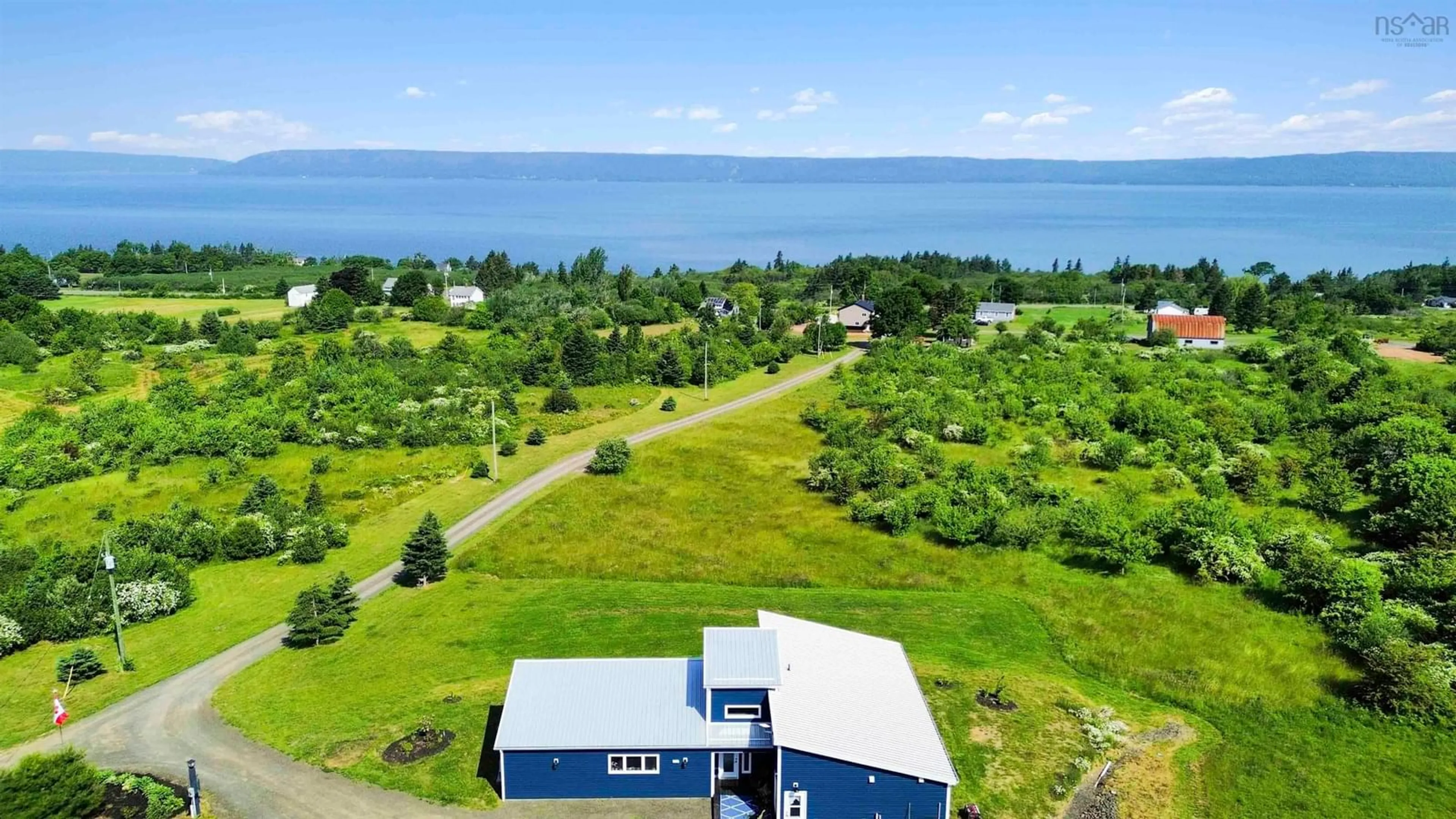 A pic from outside/outdoor area/front of a property/back of a property/a pic from drone, water/lake/river/ocean view for 59 Deep Brook Lane, Deep Brook Nova Scotia B0S 1J0