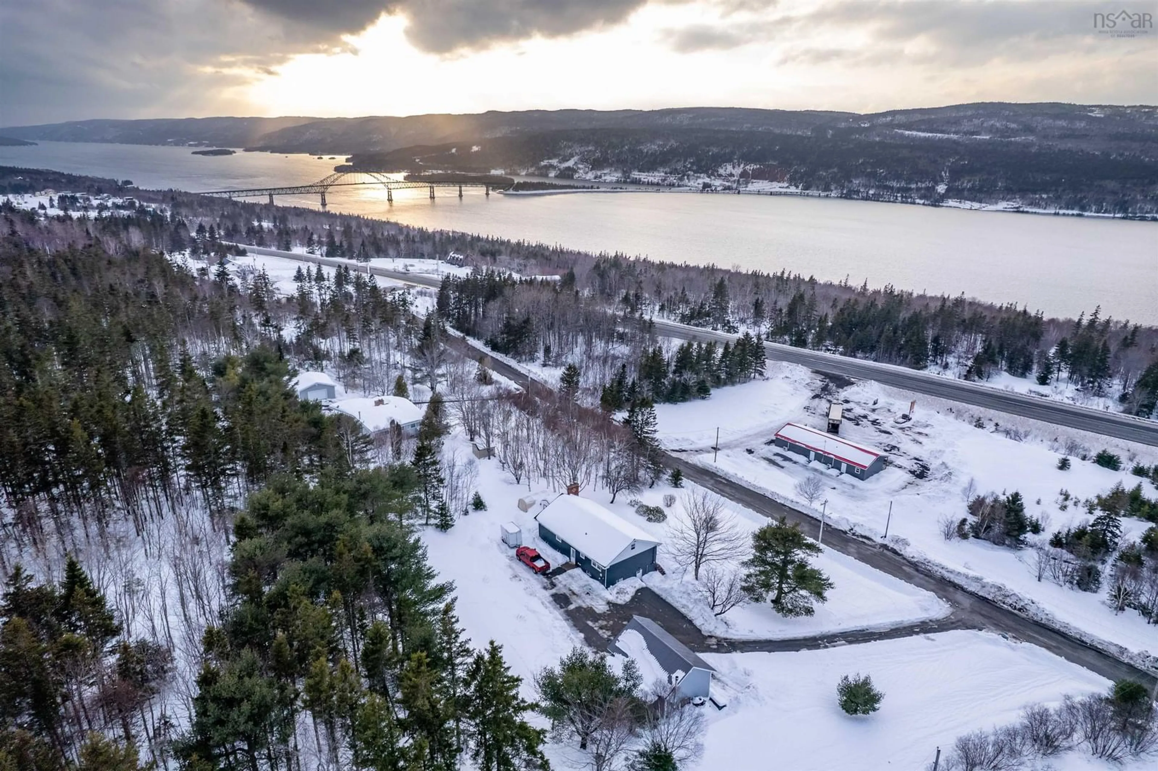 A pic from outside/outdoor area/front of a property/back of a property/a pic from drone, water/lake/river/ocean view for 58 Macbelger Cres, Boularderie East Nova Scotia B1X 1J3