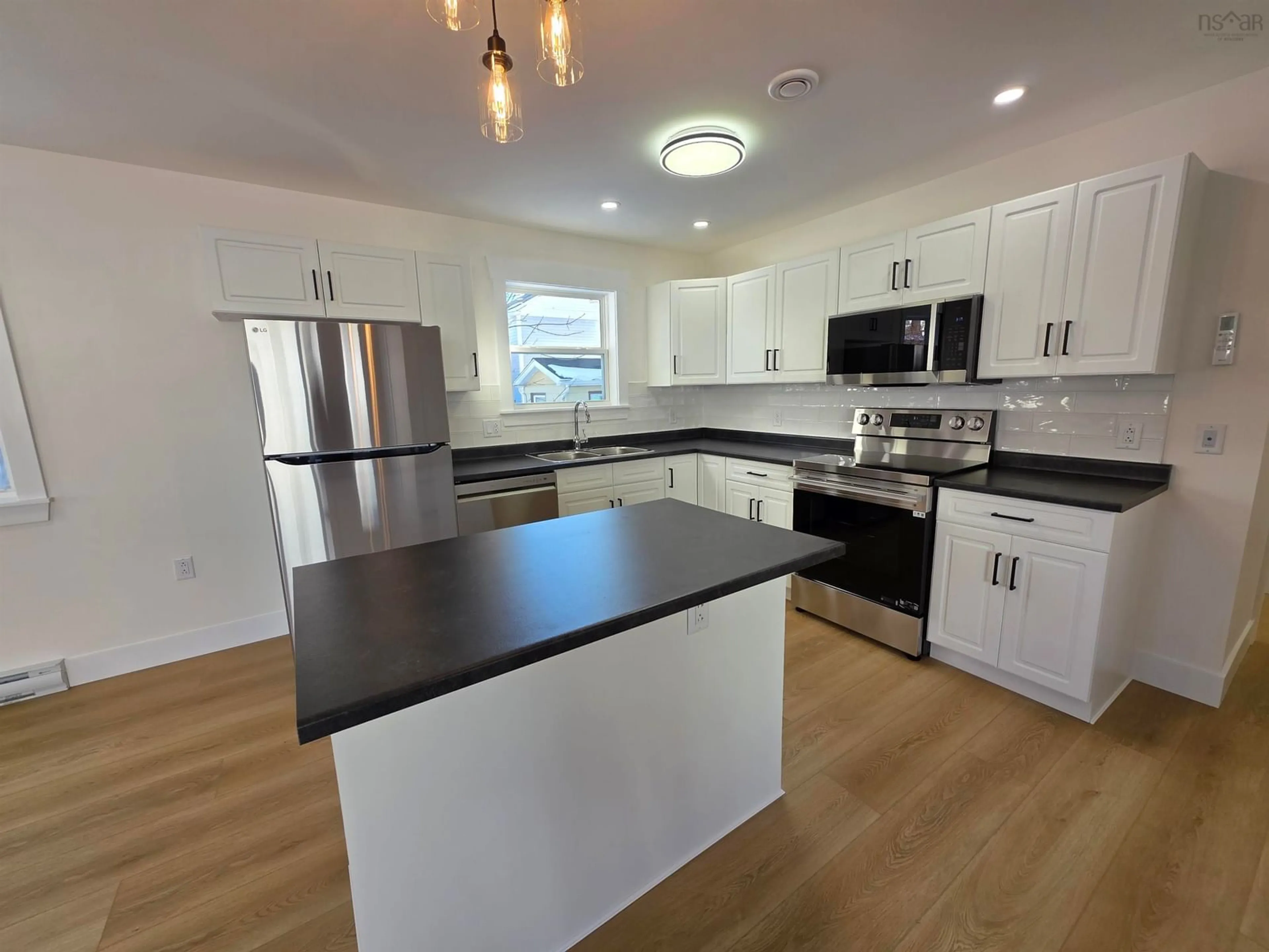 Open concept kitchen, unknown for 6 South St, Sydney Nova Scotia B1N 2M3